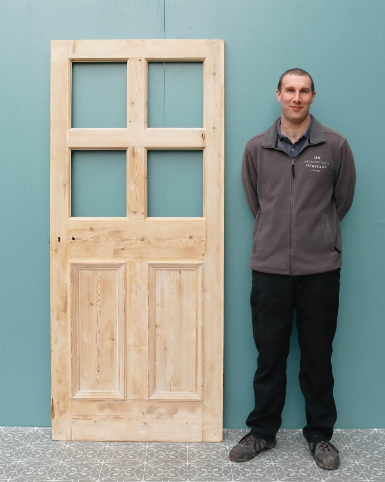 This unglazed pine door circa 1900 makes a beautiful reclaimed Victorian front door for a period townhouse. Alternatively, it could be used as an internal door for a kitchen or hallway. It features four unglazed panels to the top, allowing for