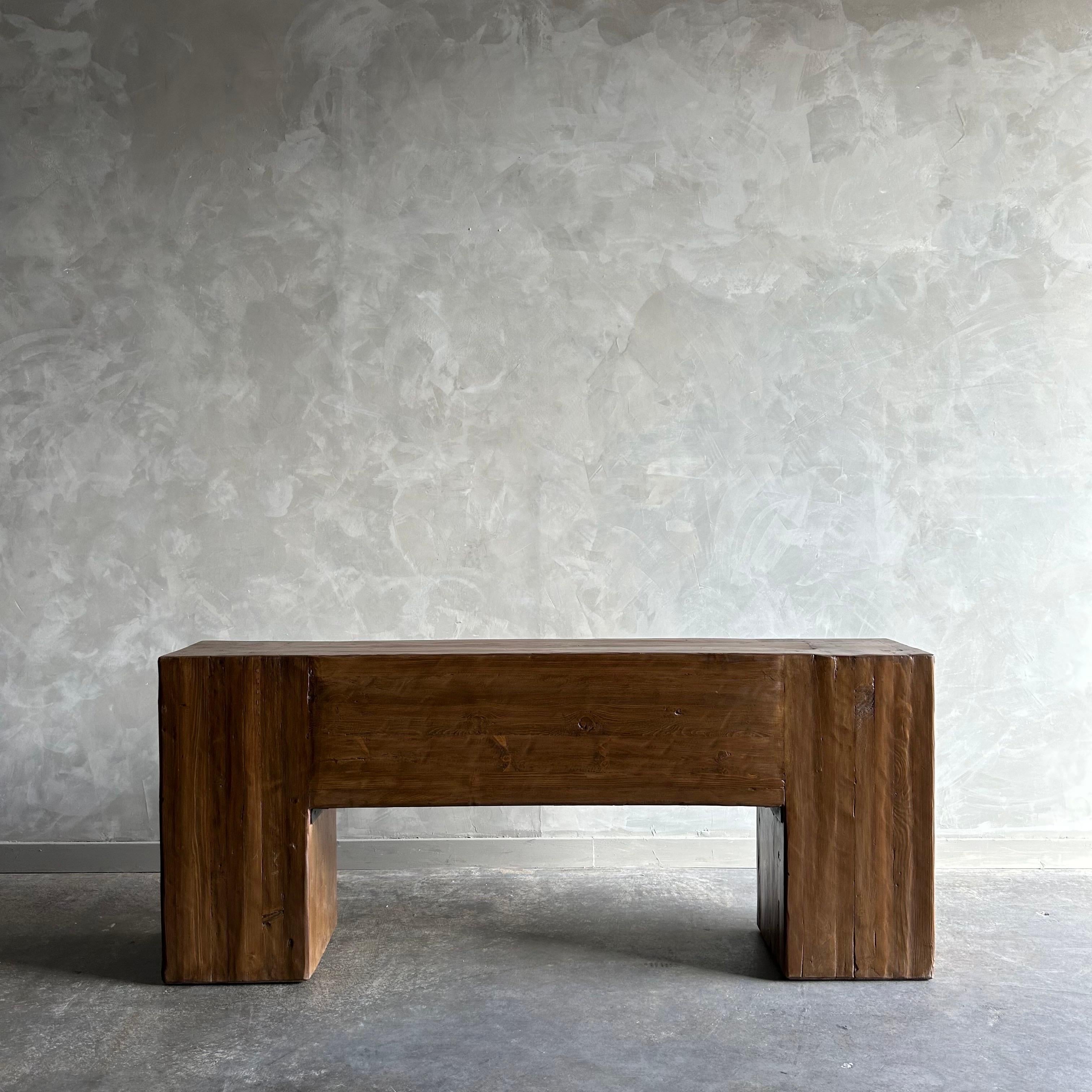 British beam console in walnut finish.
Made from reclaimed wood timbers
The artisanal construction methods of this console highlights the woods beautiful grain pattern & knots and fissures from its past life. The most authentic materials are hand