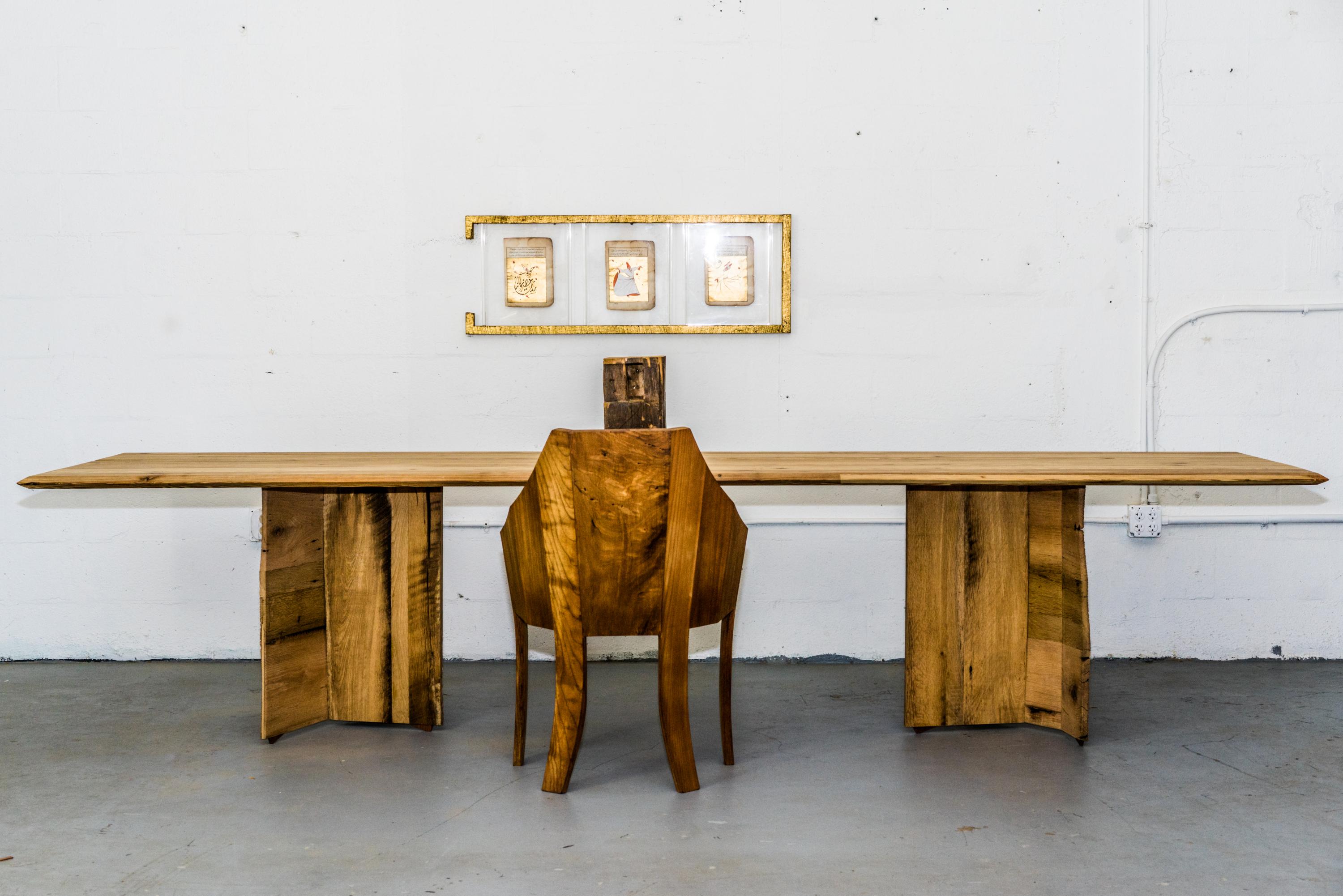 The Organica Table comprises a 100-year-old heart of pine for the top, reclaimed barn wood for the base, and a non-toxic oil finish. Heart Pine, specifically old-growth heart pine, is known for its distinct characteristics, including a rich