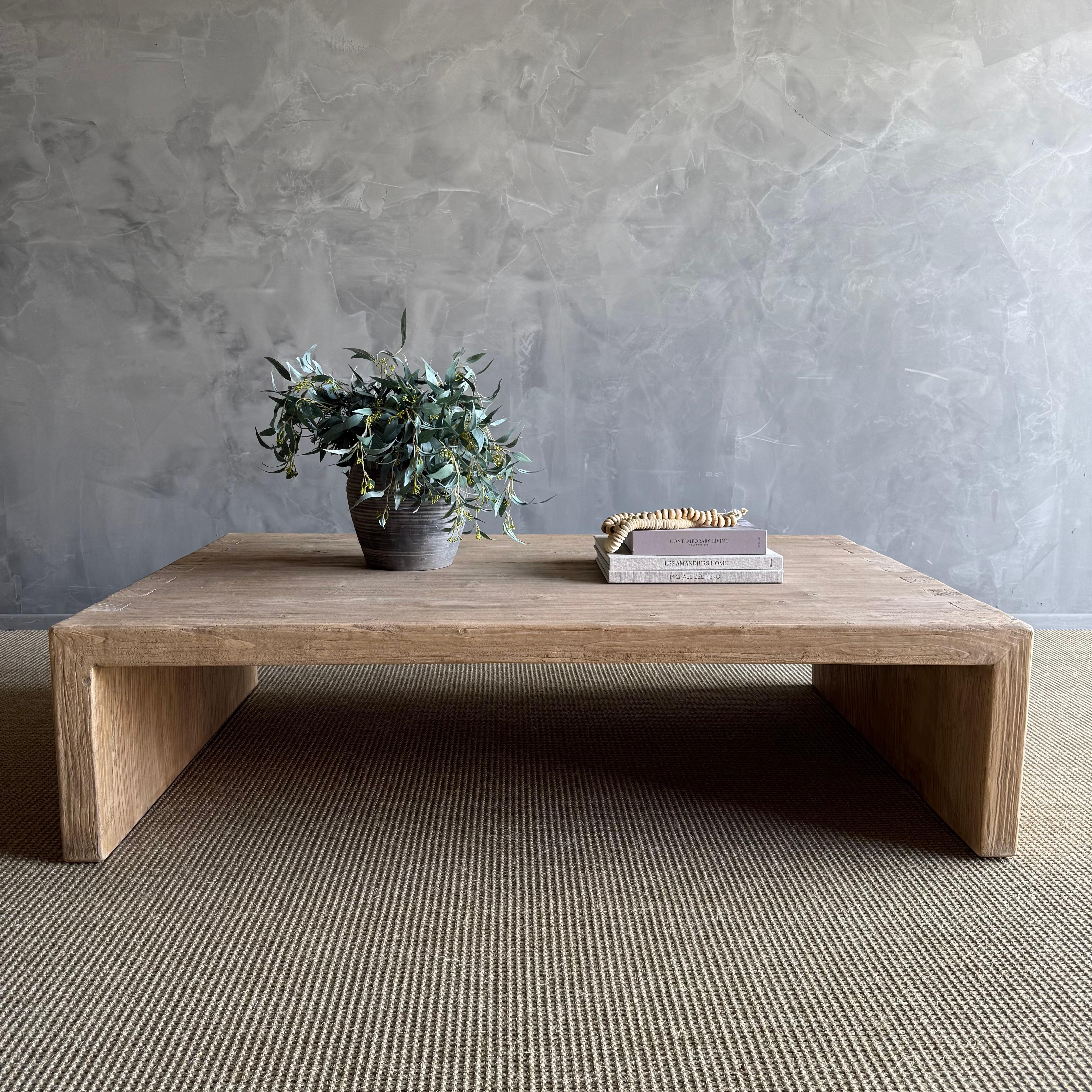 Introducing our reclaimed elm wood coffee table, a stunning piece that effortlessly combines unique details with wabi sabi reclaimed elegance. Crafted from weathered elm wood, each table is a one-of-a-kind masterpiece with its own story to tell. The