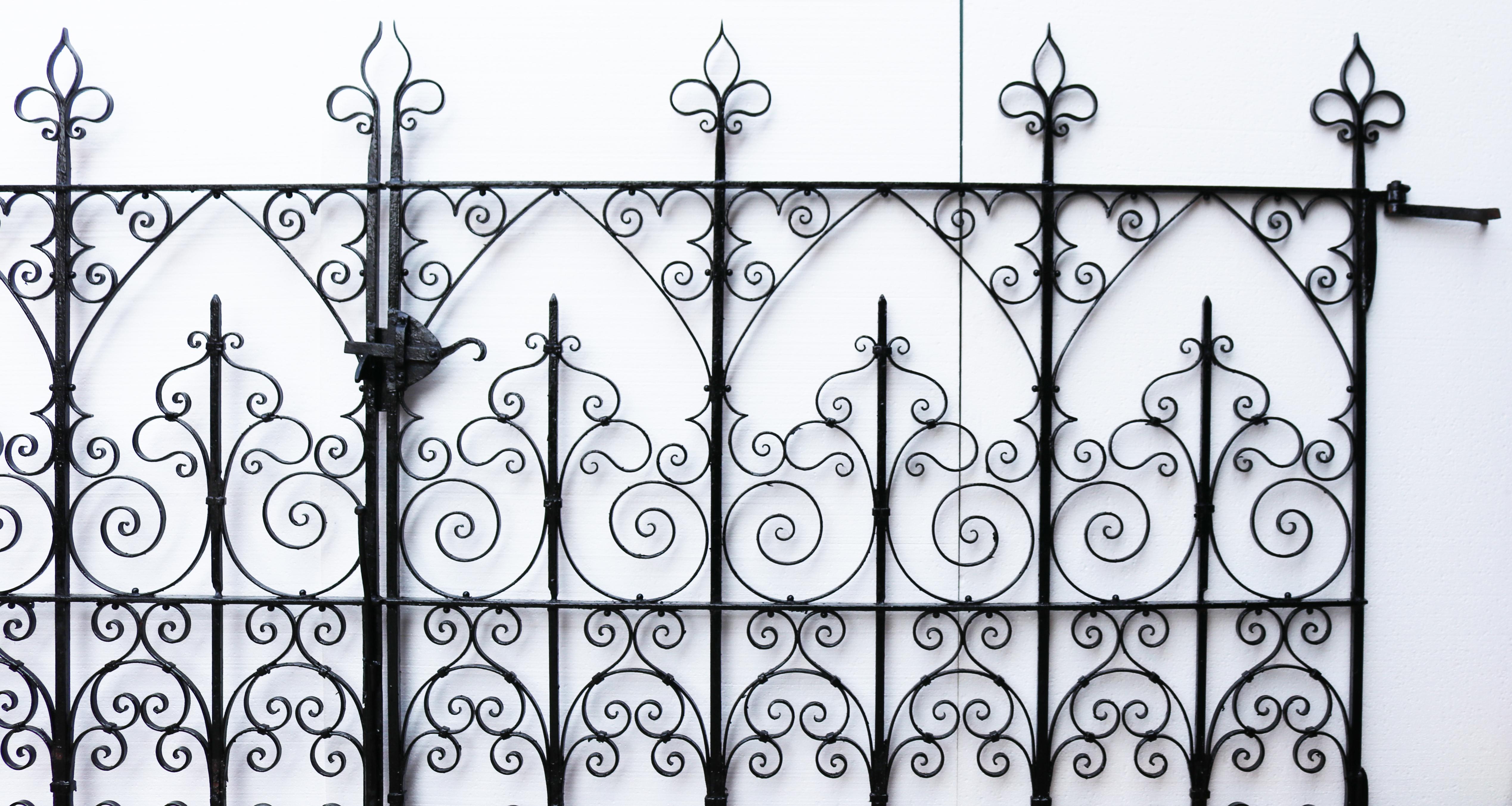 A pair of antique wrought iron driveway gates featuring an intricate scrolling pattern.

Additional Dimensions

To fit an opening of approximately 396 cm (13 feet)