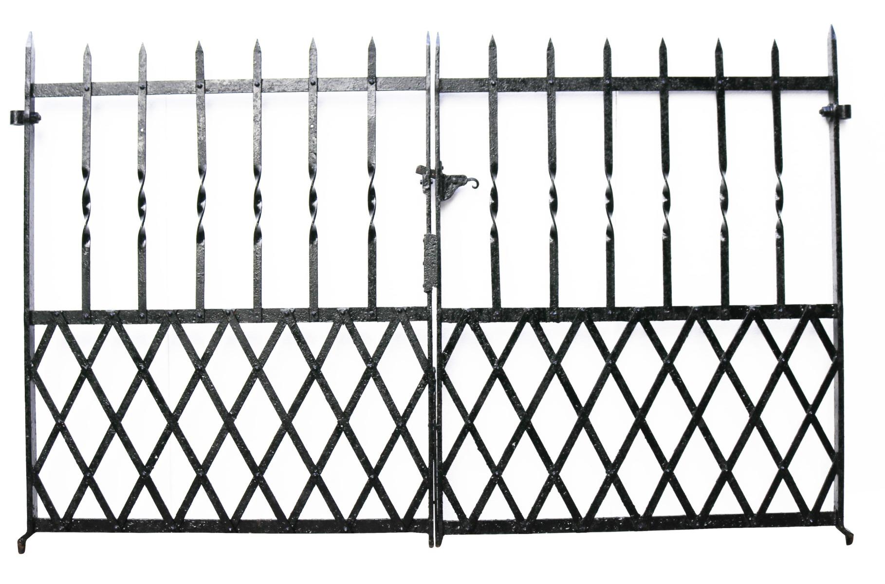A set of antique gates constructed from wrought iron.