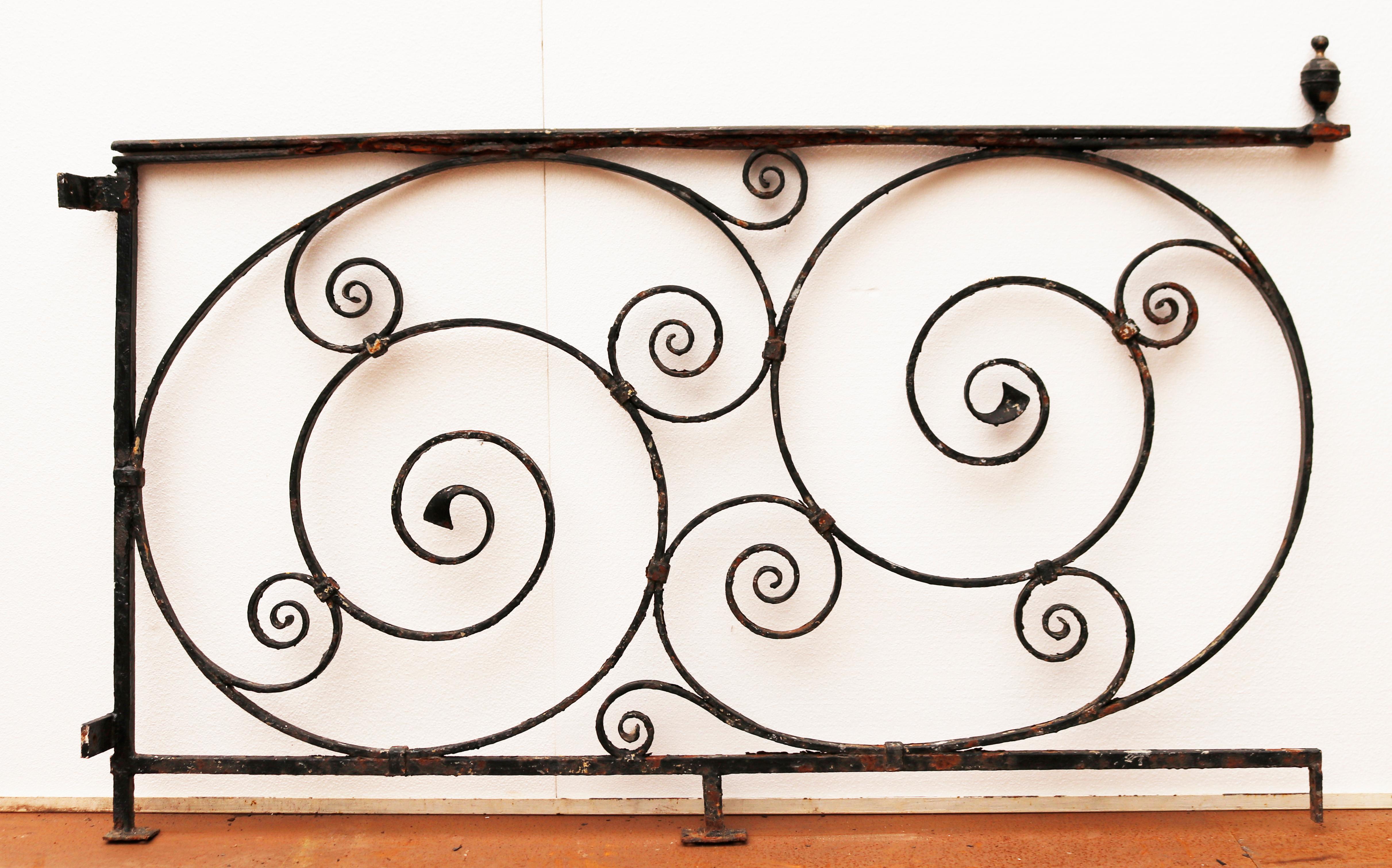 Antique wrought iron railings, 7.1 meter, with scrollwork pattern.

Additional dimensions

All three pieces are 84 cm in height (2 ft 7 inches)

Width of all three pieces side by side 715 cm (23 ft 4 inches)

Depth of all three pieces 4
