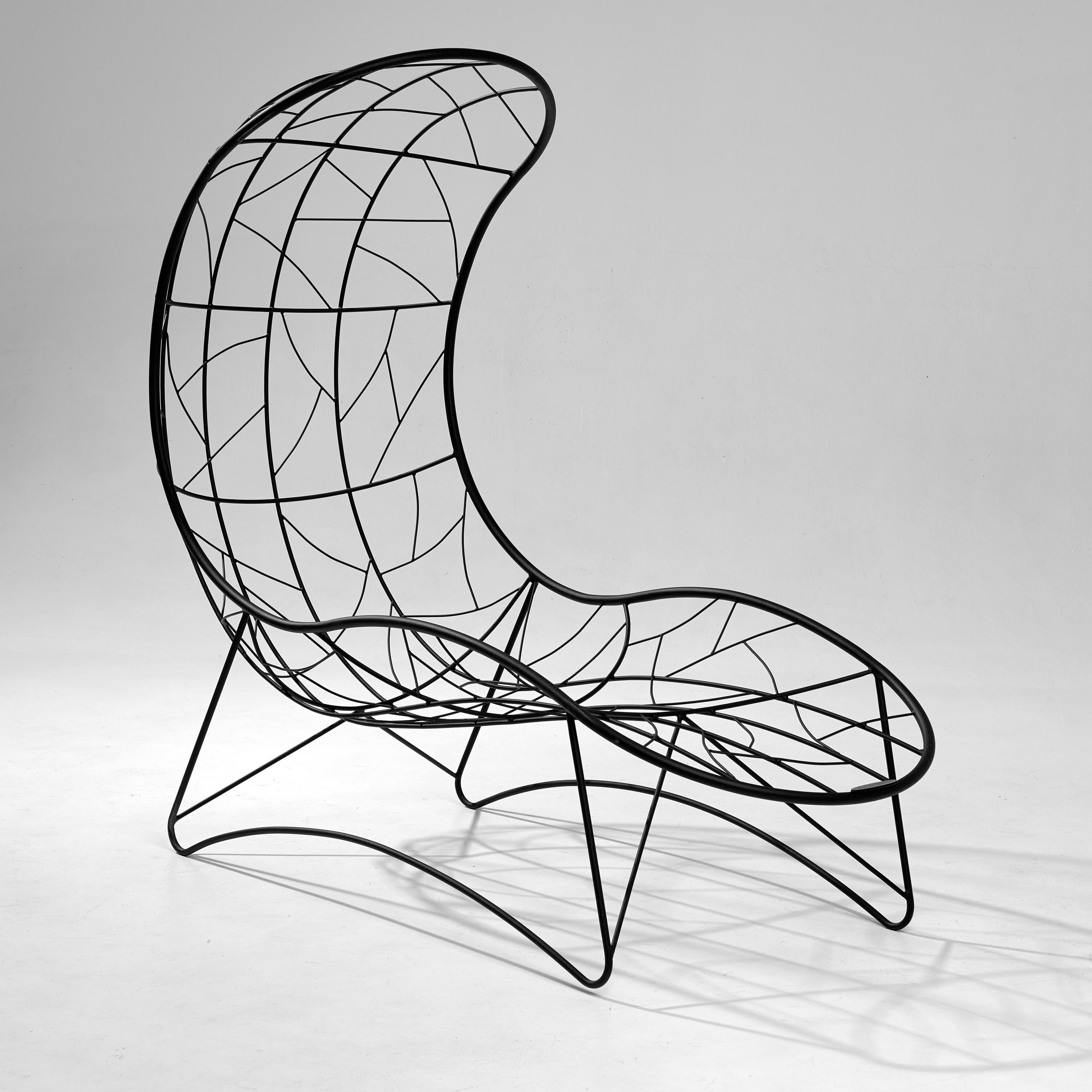 The recliner chair is sculptural and dynamic. Fluid and organic, they lend themselves for use as functional art pieces. The chair shape is inspired by the Cape Cobra and the pattern detail is reminiscent of the veins in leaves, tree branches
