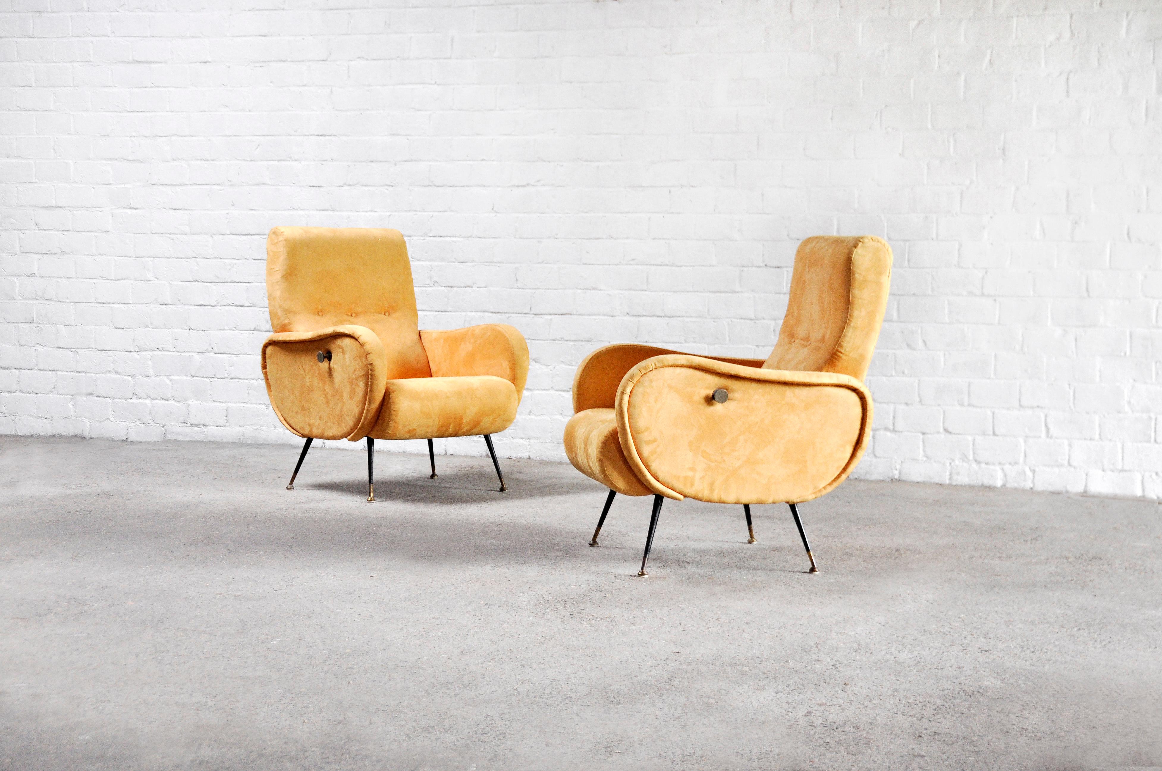 Pair of midcentury Italian armchairs attributed to Marco Zanuso, Italy 1950’s. The armchairs are newly lined in a very attractive yellow velvet fabric. The particularity of the seats is their mechanism that makes the armchair reclining for extreme
