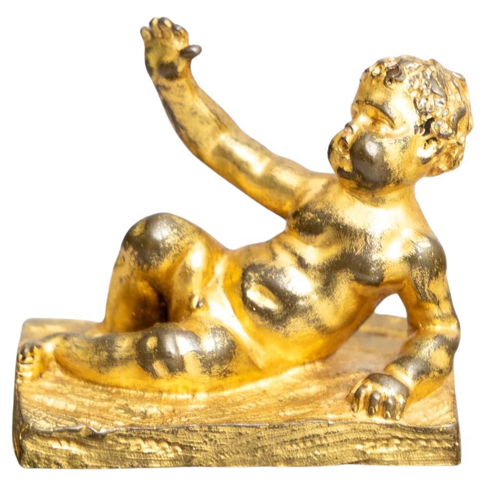 Reclining Bronze Putto, 19th Century For Sale