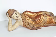Reclining Buddha or Draped in Golden Robes with a Jeweled Border and Headress