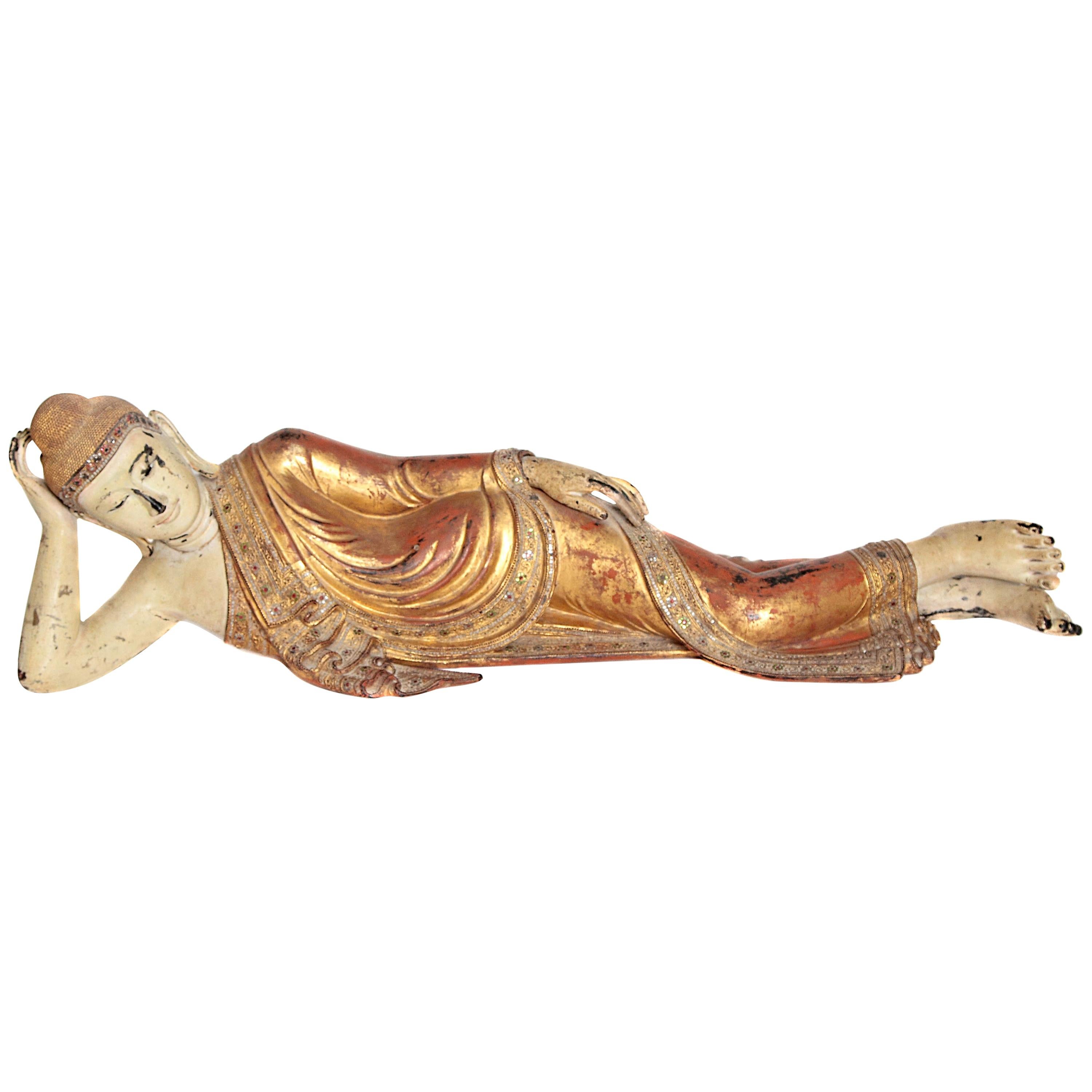 Reclining Buddha or Draped in Golden Robes with a Jeweled Border and Headress