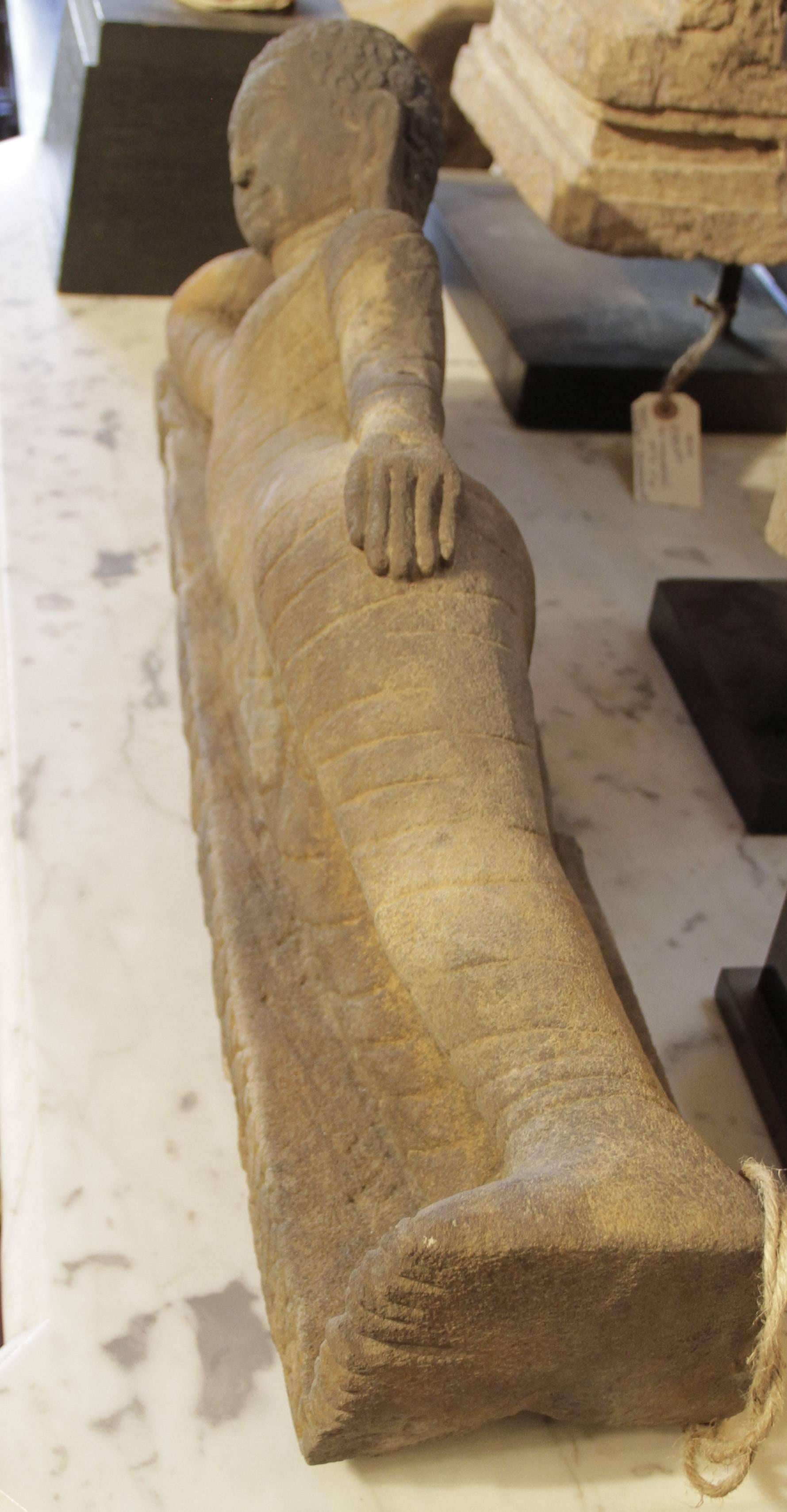 This sandstone sculpture of Buddha is from Burma
Measures: It is 27 L x 10 H x 5 D.