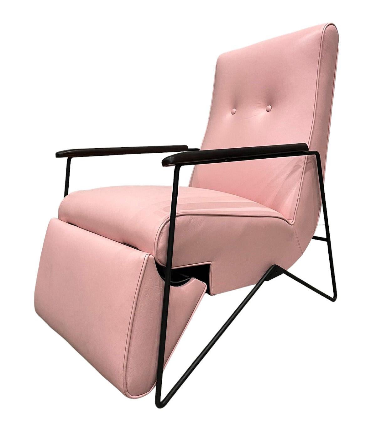 Available today, with domestic shipping in NYC metro area included, This  Modern Century Reclining Chair in Metal Hardwood and Leather Ernesto Hauner 1960 is nothing less than gorgeous!  

Indulge in unparalleled comfort with this reclining