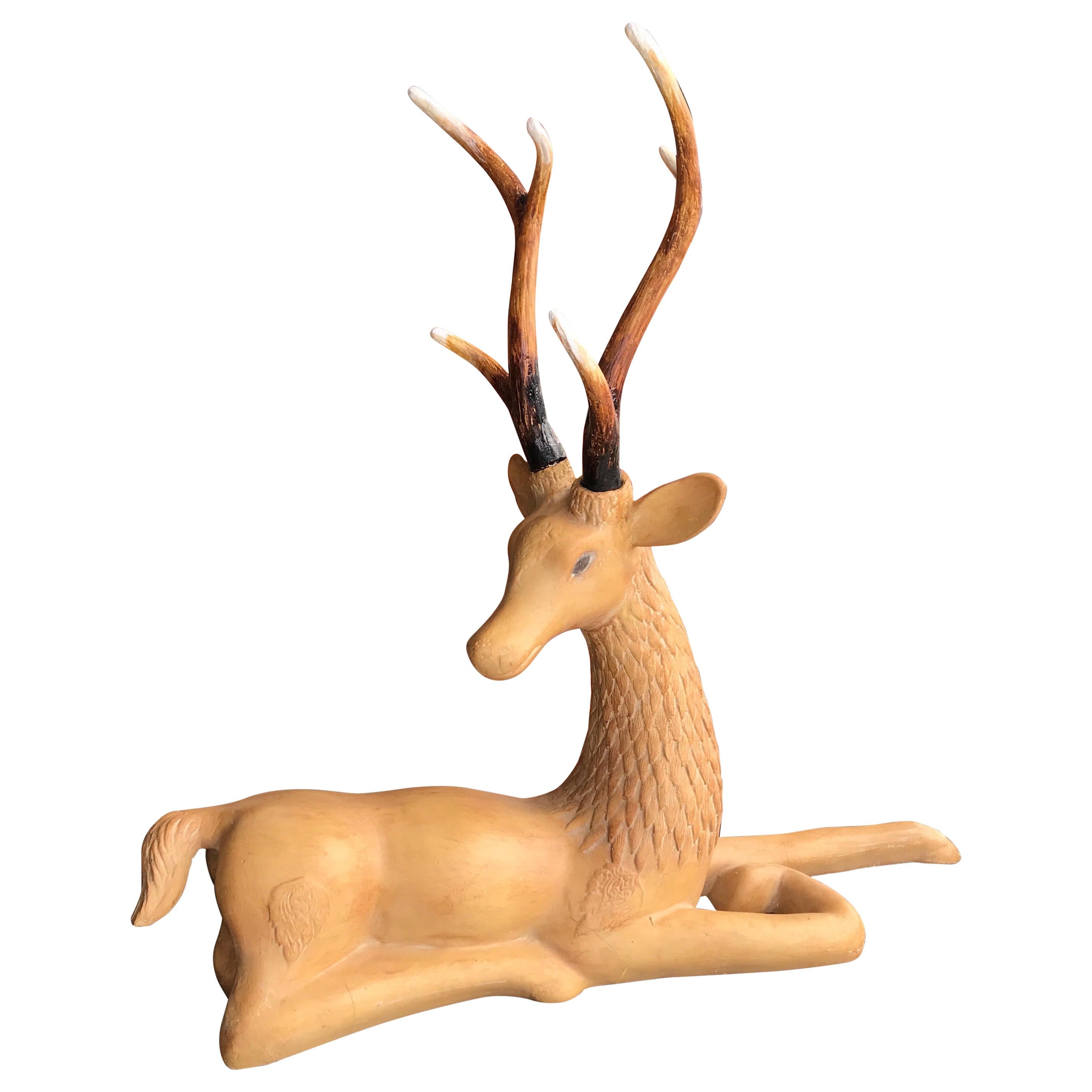 Reclining Deer with Antlers