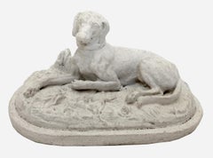 Reclining dog, plaster statuette France, circa 1880