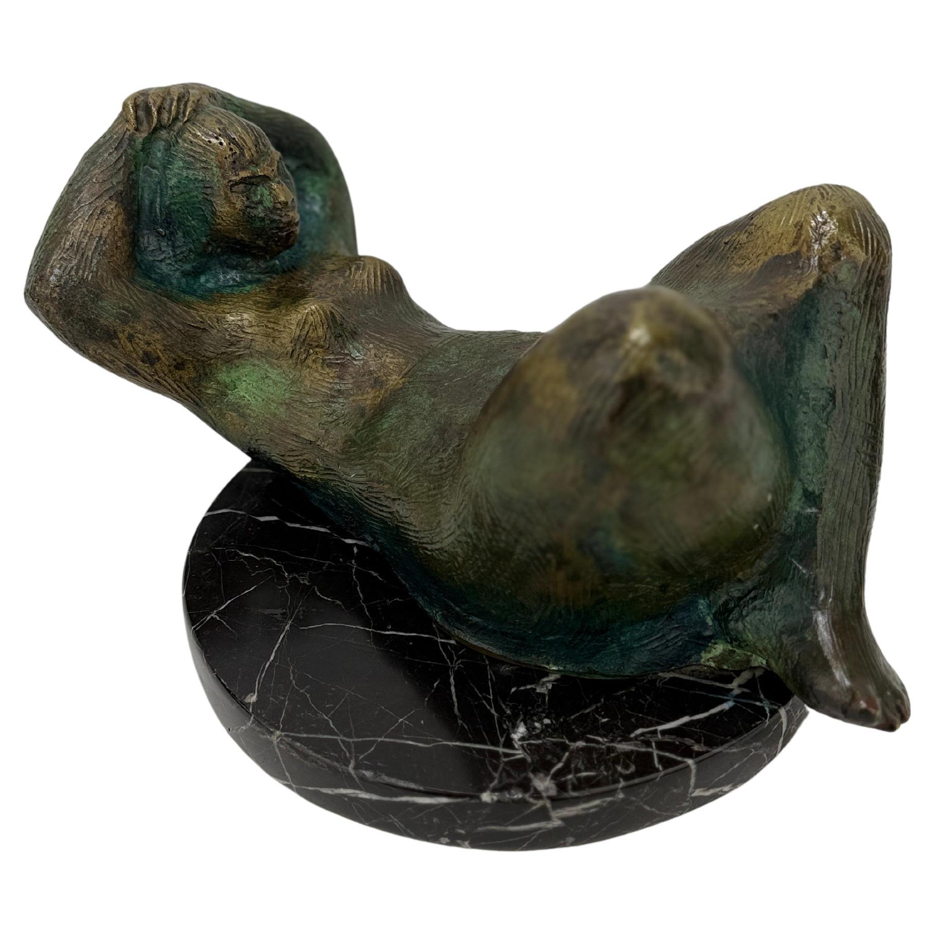 Escultura de bronce de desnudo femenino reclinado - Firmada d.a. 71'