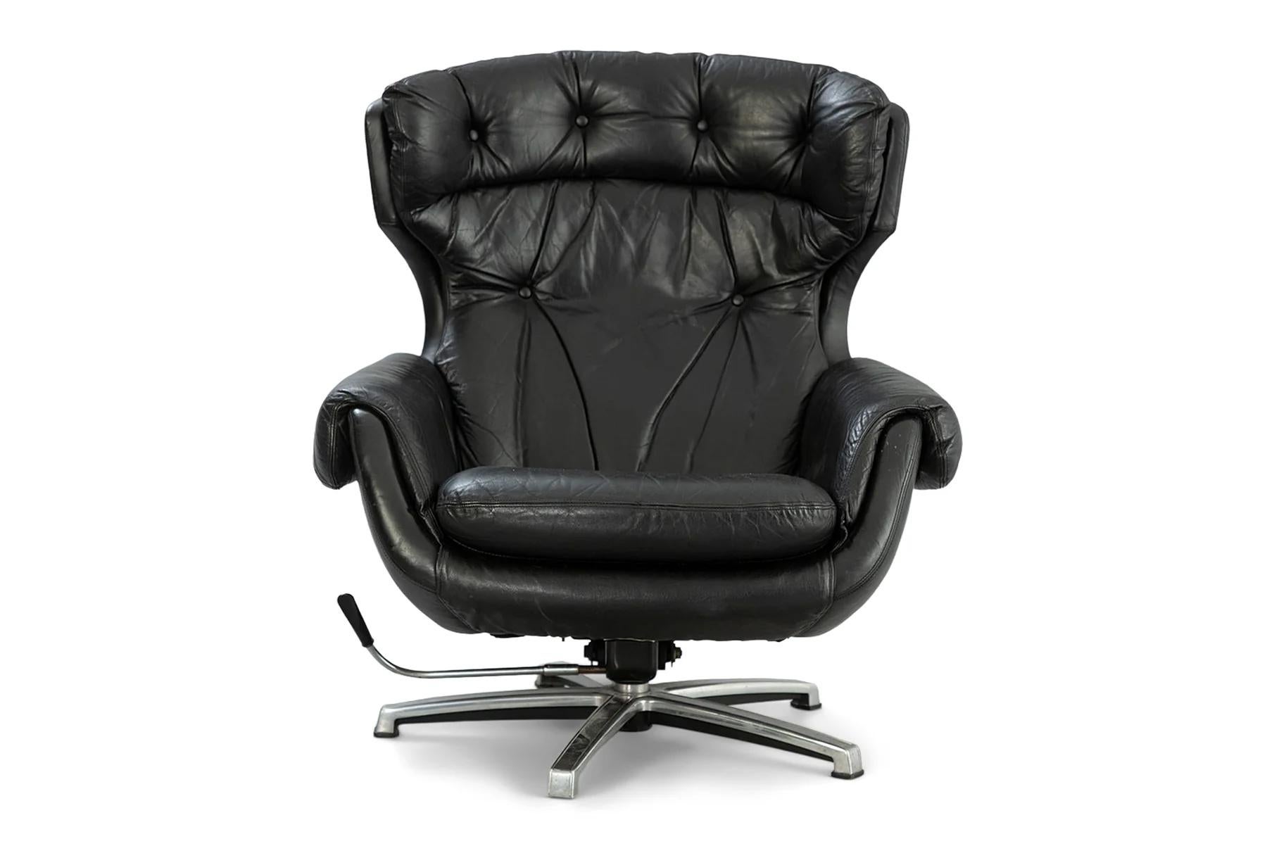 Mid-Century Modern Reclining finnish lounge chair + ottoman in black leather For Sale