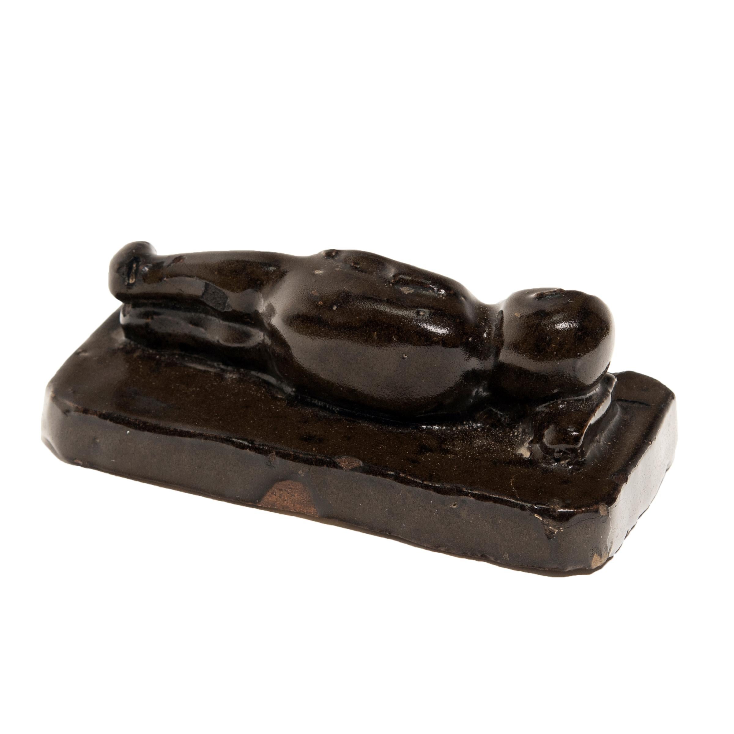 Qing Reclining Ho Ho Boy Charm Weight, c. 1850 For Sale