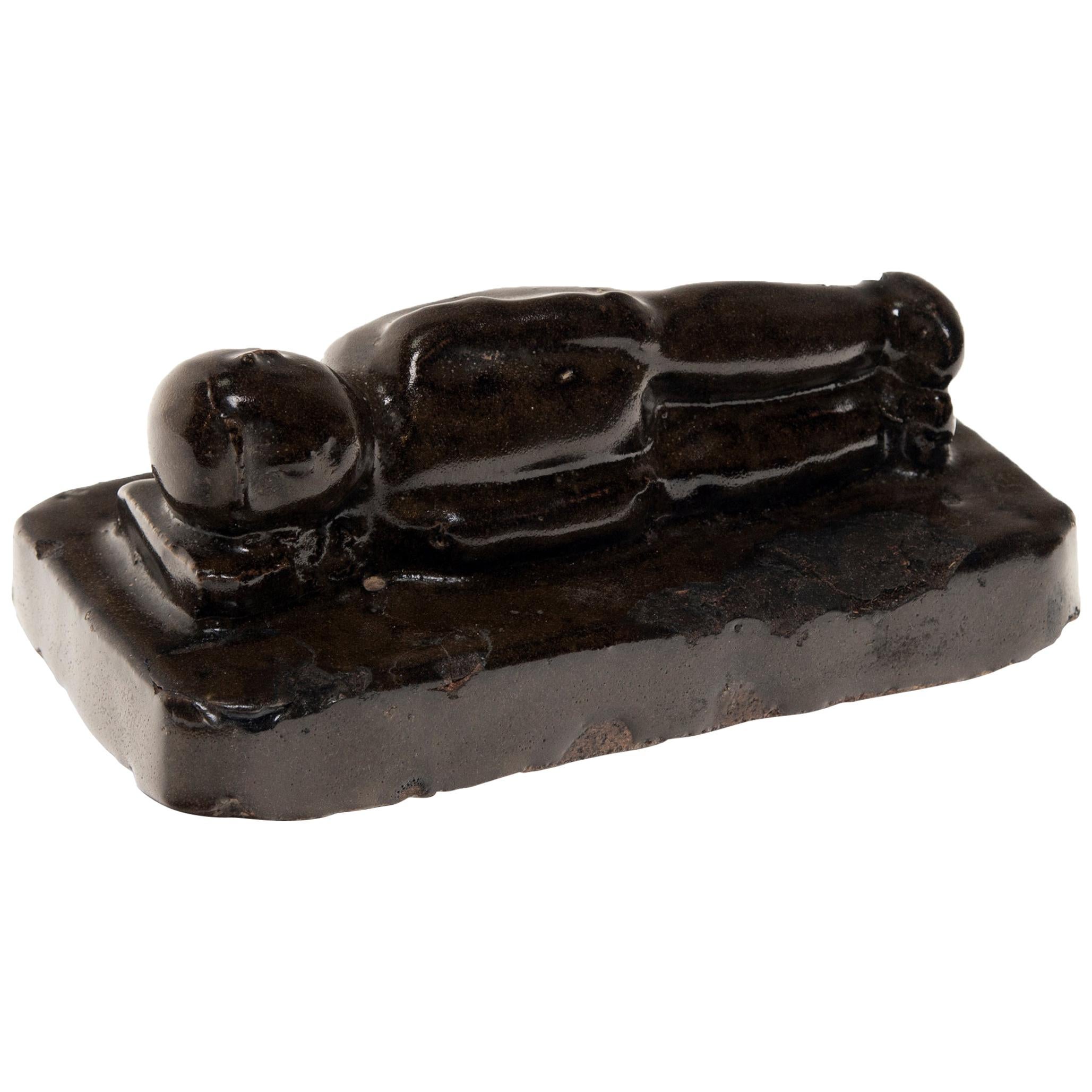 Reclining Ho Ho Boy Charm Weight, c. 1850 For Sale