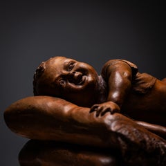 Reclining infant in terracotta, sign. F. Sans, probably Spain, Late 19th century