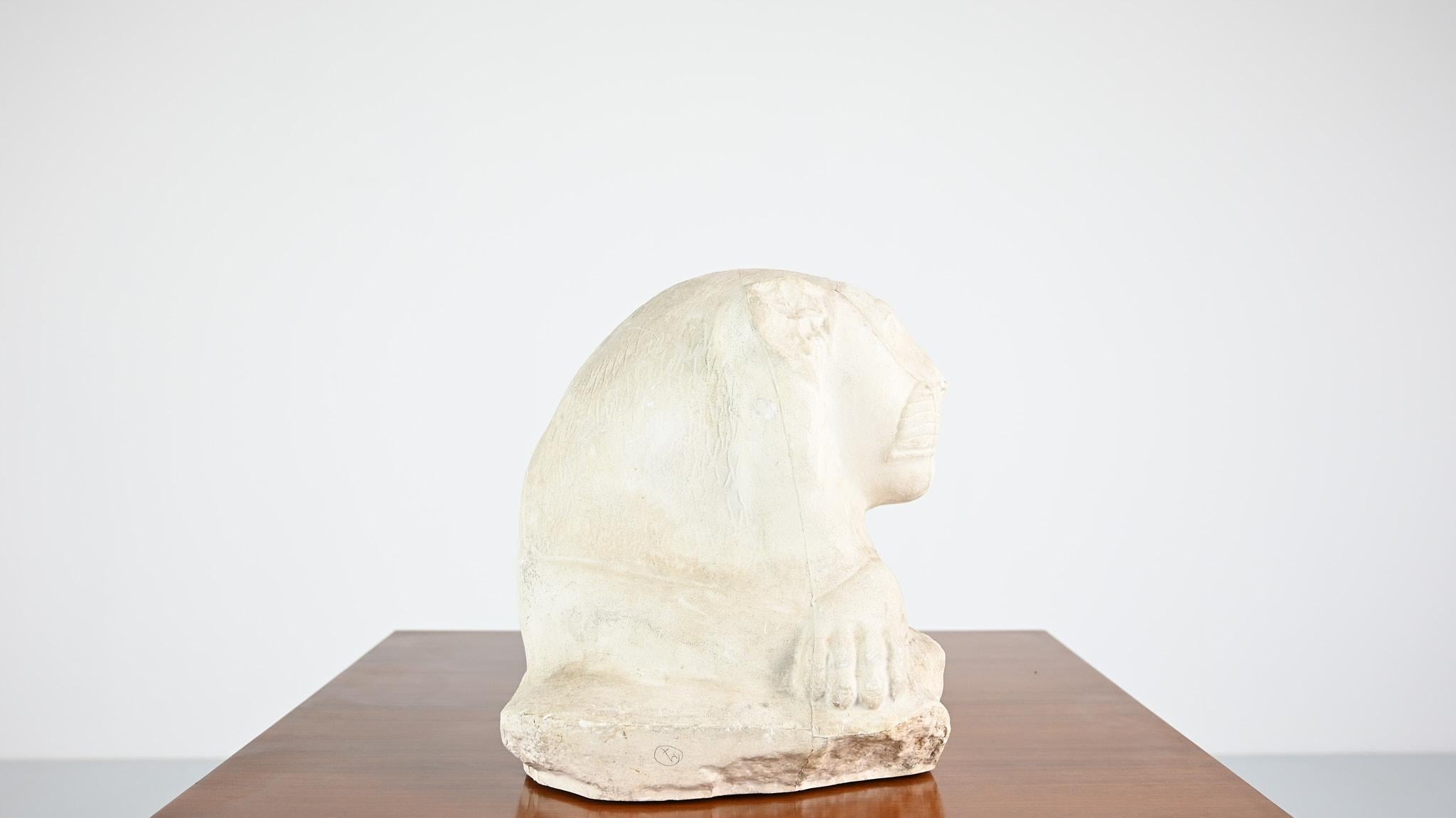 French Reclining lion, vintage reproduction in plaster. France, C.1970