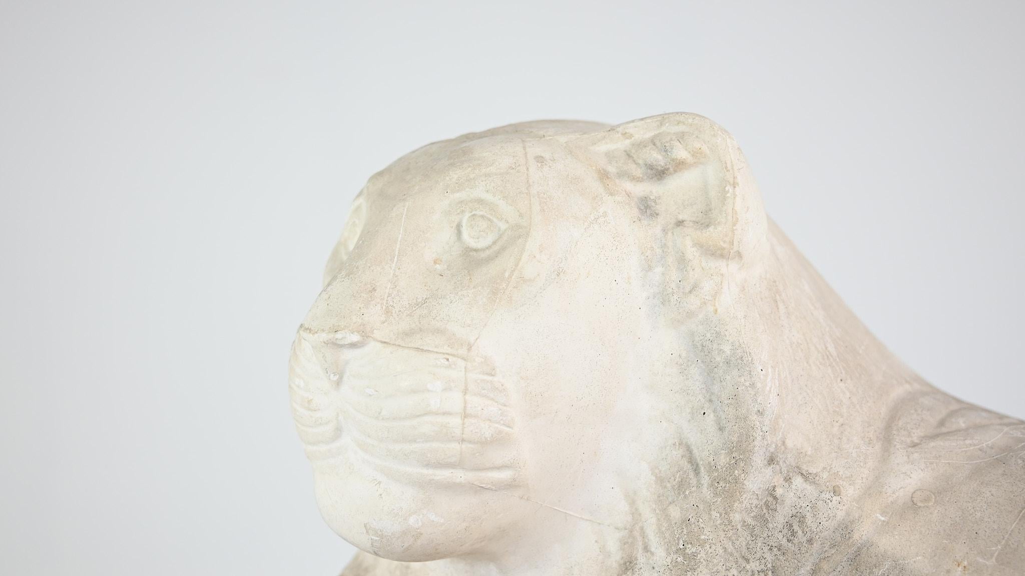 Reclining lion, vintage reproduction in plaster. France, C.1970 2