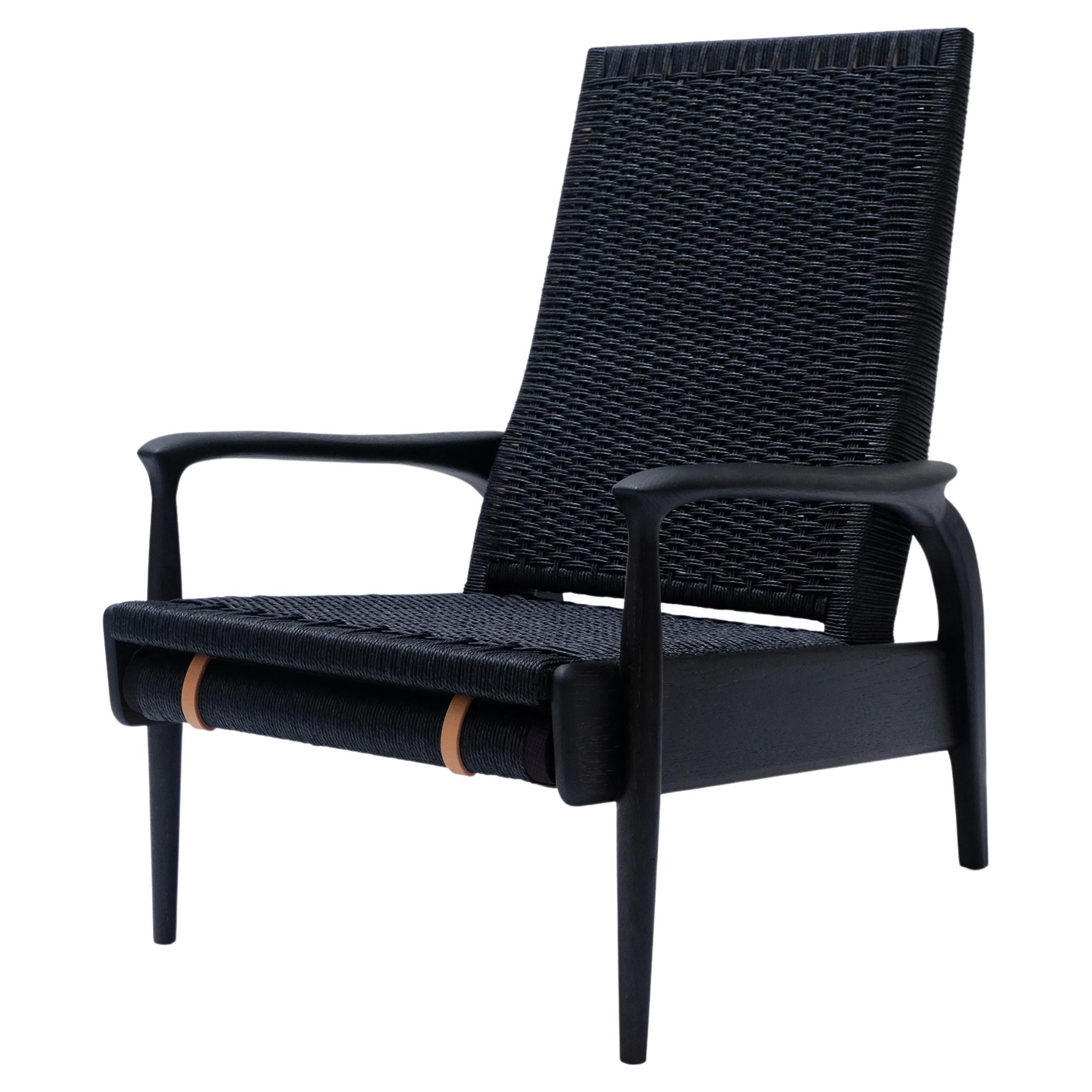English Reclining Lounge Chair in Blackened Oak& Black Danish Cord with Leather Cushions For Sale
