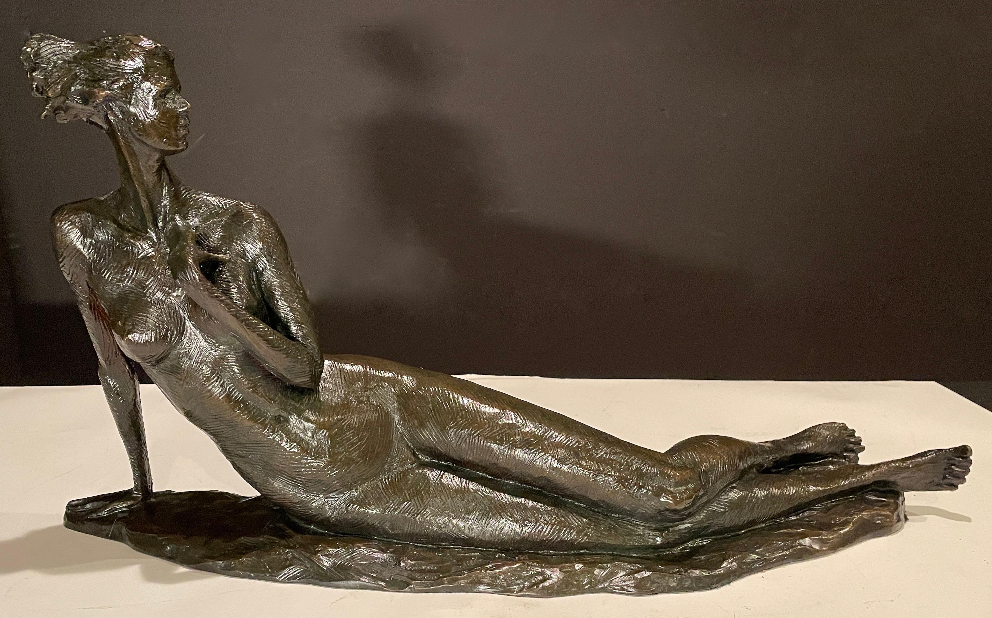 Fine quality highly stylized female nude bronze sculpture by Tom Corbin (American, b. 1954). Signed dated and numbered. Beautiful patina.
Artist: Tom Corbin
Numbered Edition: 41/75
Date: 2000.