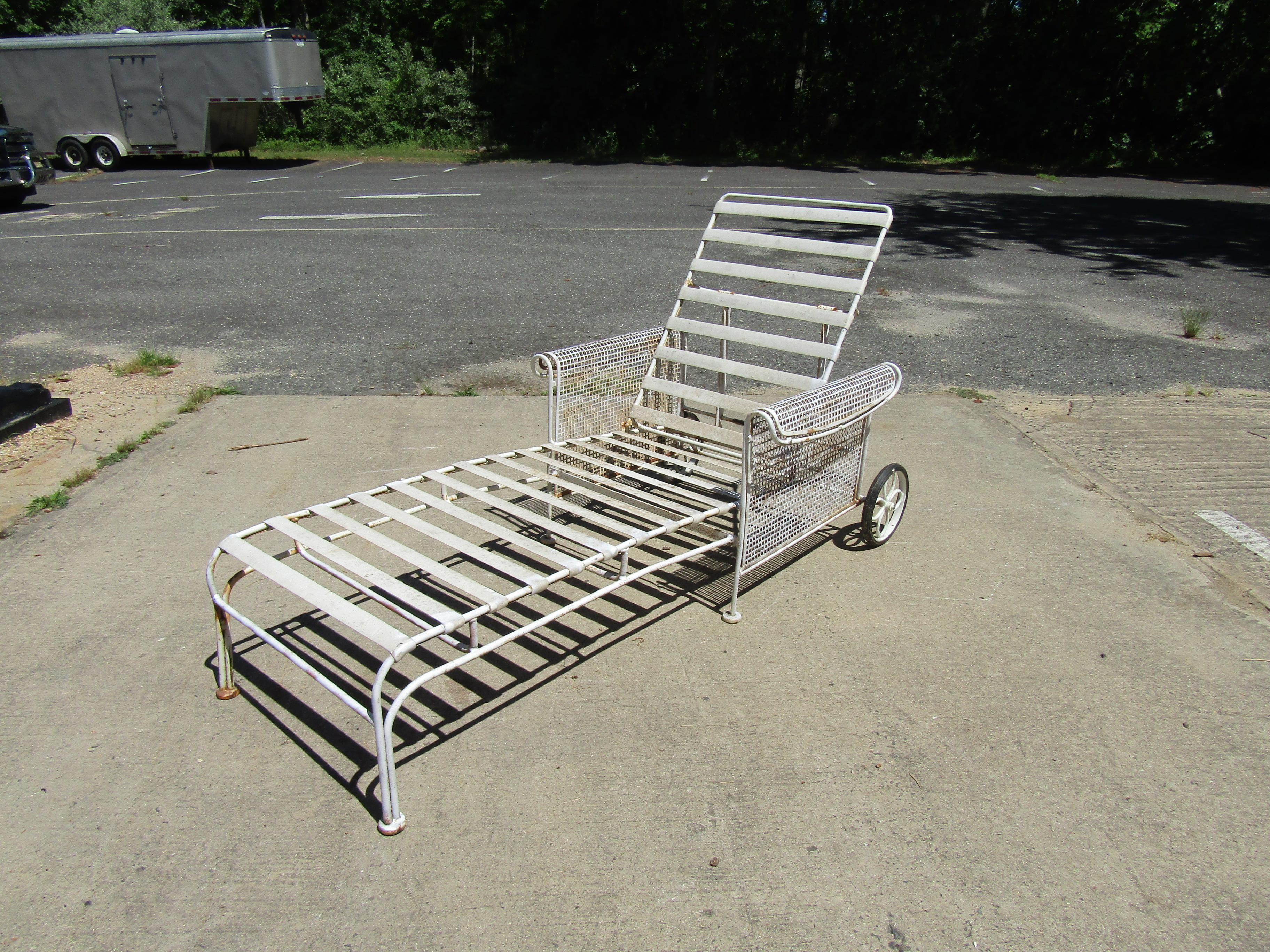 This metal reclining lounge chair is great for adding unique and comfortable seating to an outdoor space. Please confirm item location with seller (NY/NJ). 