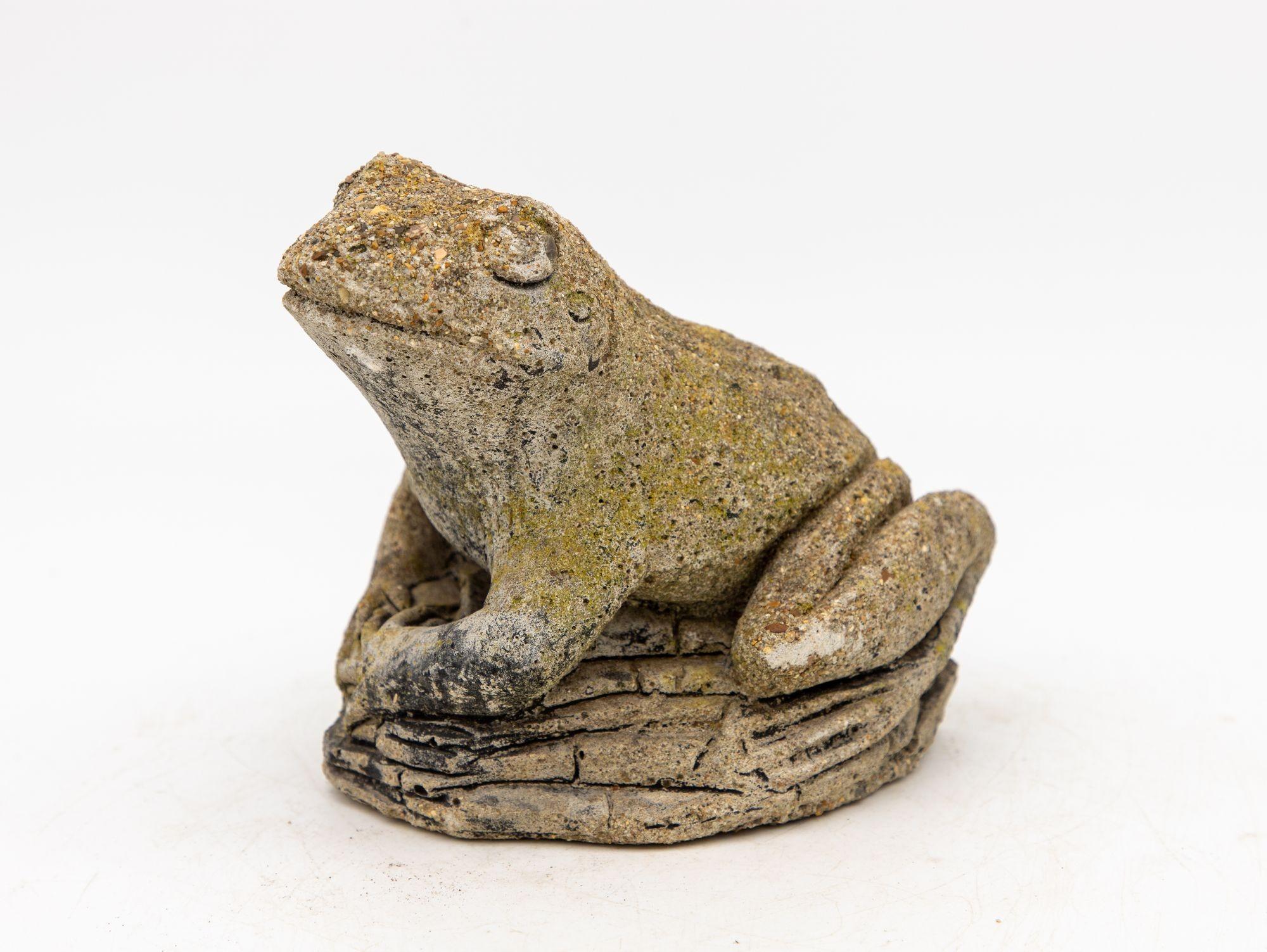 This delightful reconstituted stone frog garden ornament brings a touch of whimsy and charm to your outdoor space. This ornament features an honest patina, giving it an authentic and aged appearance, and is covered in natural moss that adds to its