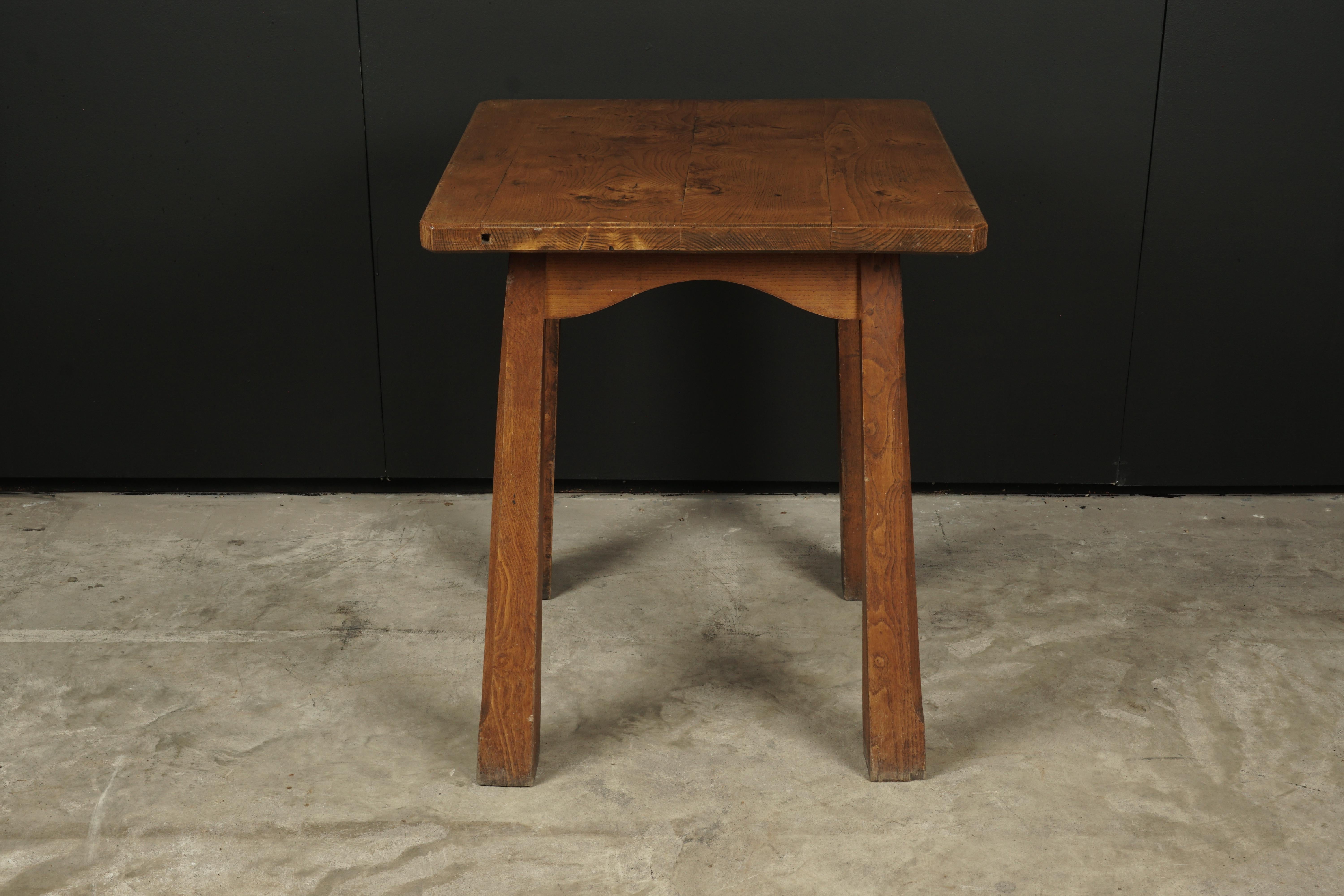 Vintage reconstruction table from France, circa 1950. Thick solid pine construction with light wear and patina.