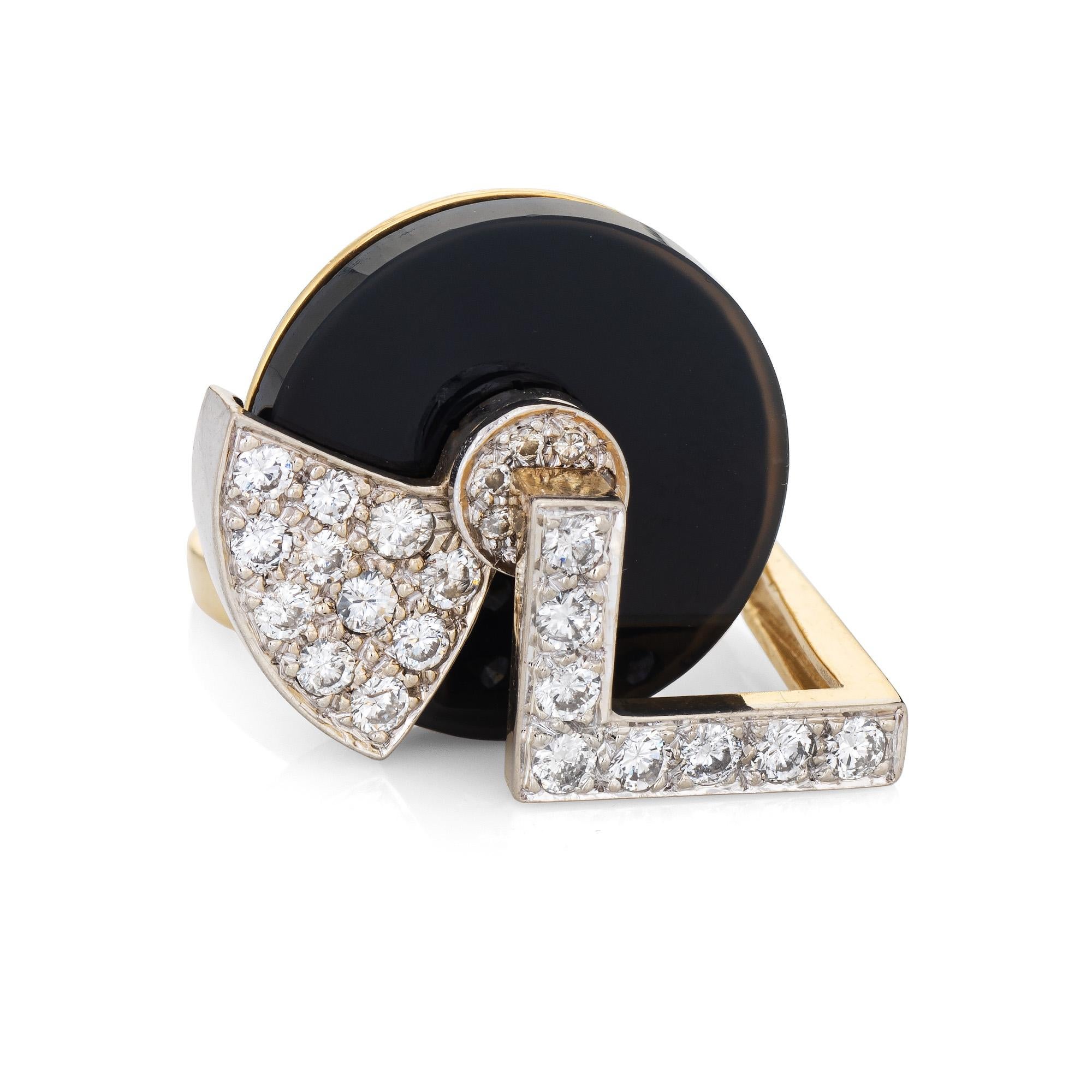 Distinct and unique onyx & diamond spinning ring (circa 1960s to 1970s), crafted in 18 karat yellow gold. 

Diamonds total an estimated 1 carat (estimated at H-I color and VS2-SI1 clarity). The onyx measures 19mm. The onyx is in very good condition