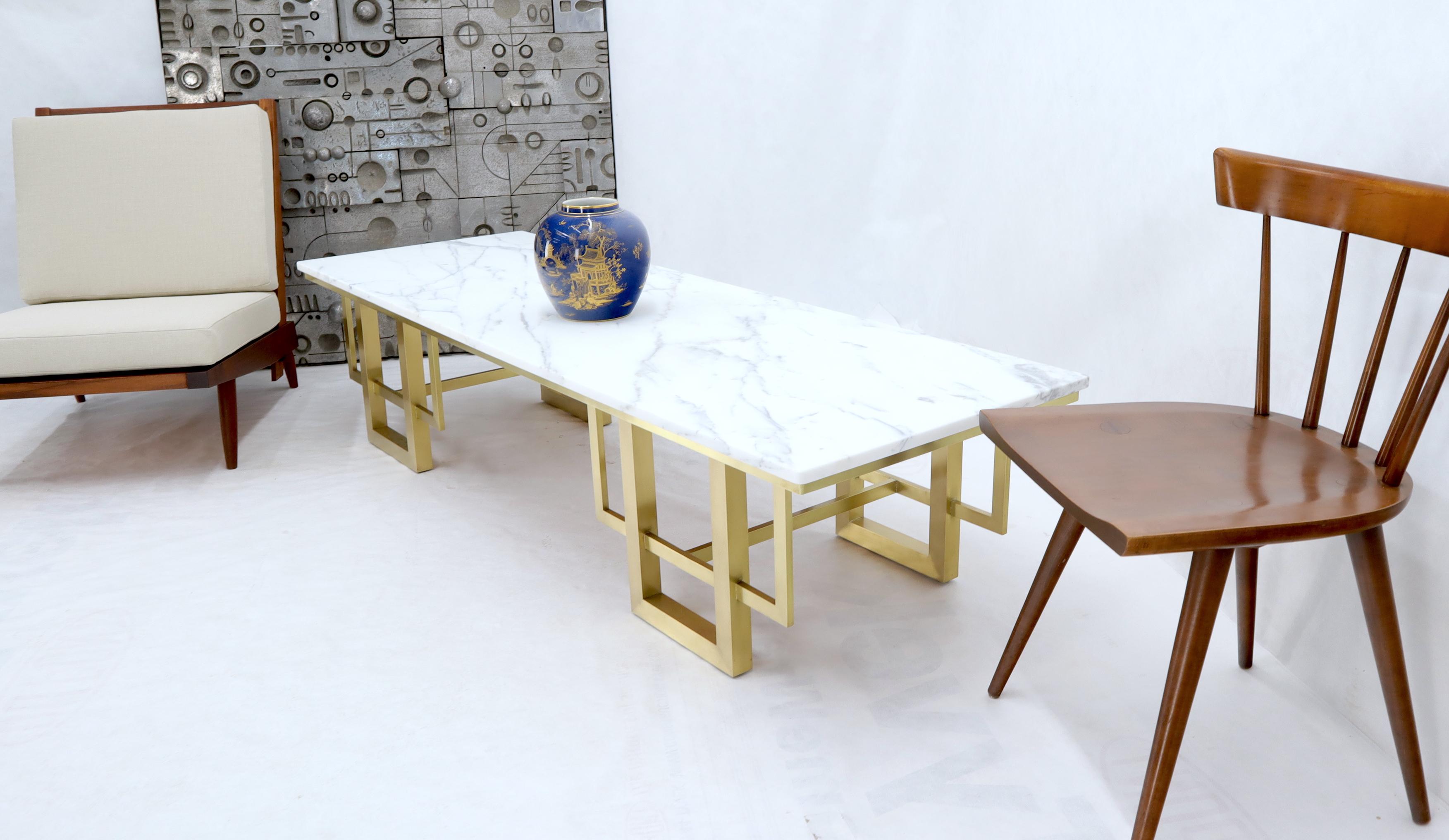 Stunning studio made rectangle marble top brass base coffee table. Parzinger decor match. Measures: 6 foot long.