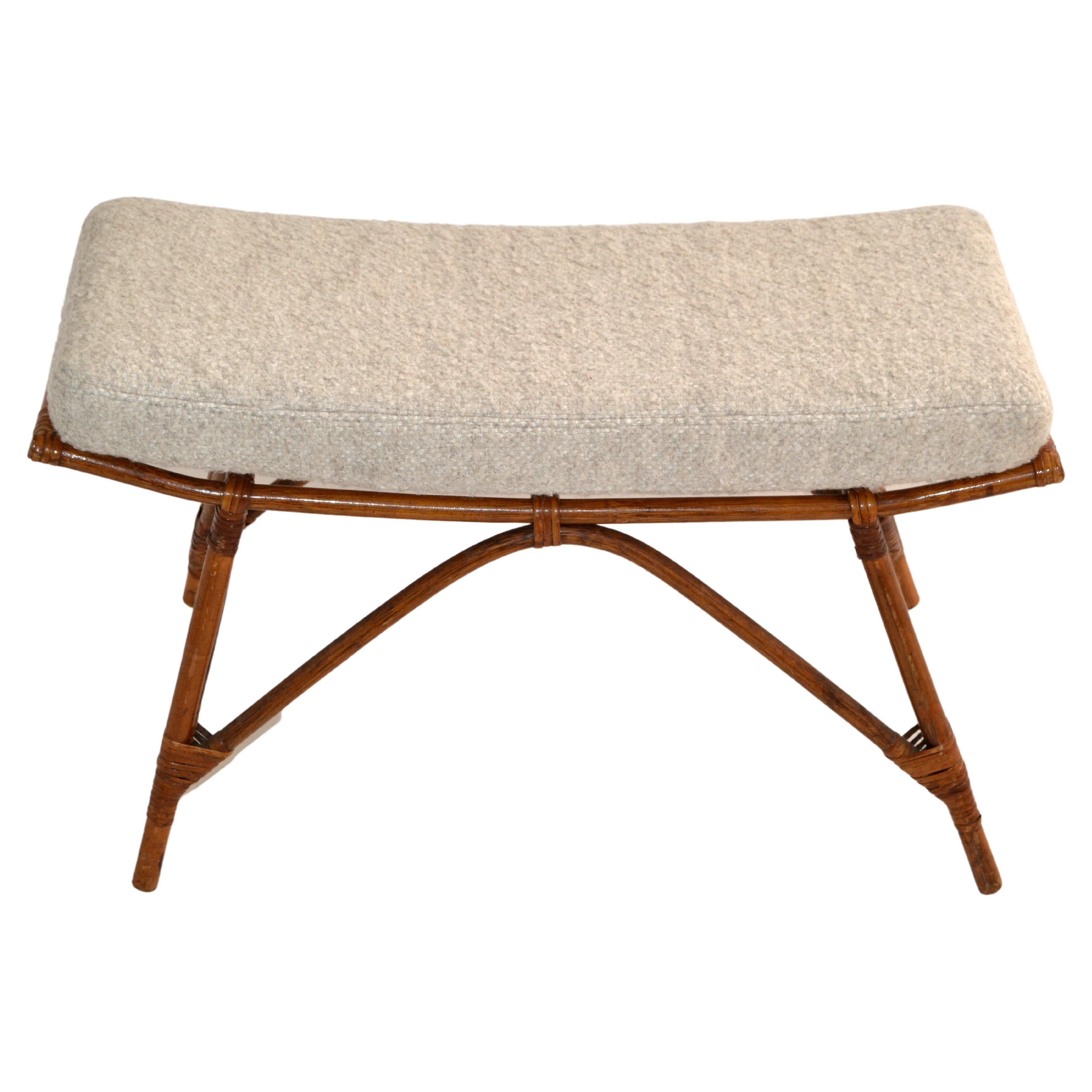 One Bohemian style Asian shaped bamboo bench in sand color wool Bouclé Basketweave upholstery with handwoven Cane Bindings.
Comes with removable Seat Cushion. 
Mid-Century Modern Design made in the late 20th Century in America.
In ready to use