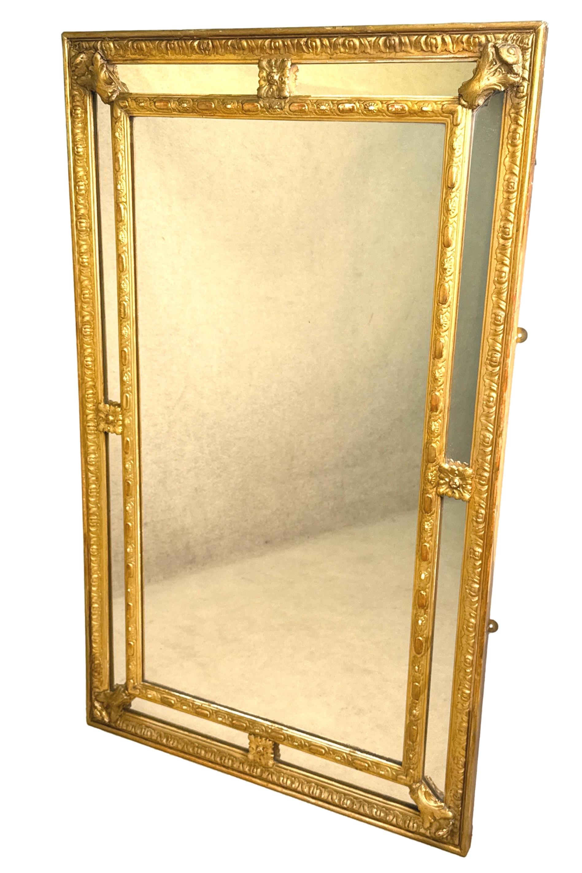 An Extremely Charming Mid 19th Century, Victorian Period, Giltwood And Gesso Rectangular Overmantle Mirror, Or Pier Mirror, Having Mostly Original Sectioned Mirror Plates Set Within Attractively Carved Foliate Borders.


A very attractive and