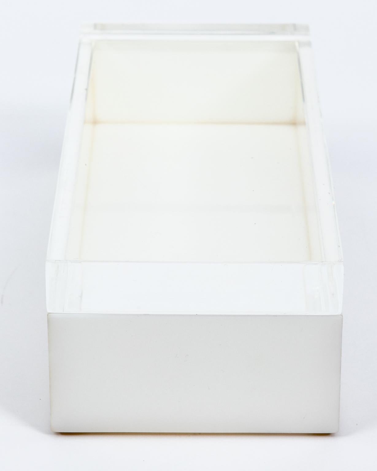 Circa 1970s rectangular Alessandro Albrizzi mid-century signed Lucite box that is clear on top and white on bottom in two part box. Made in Italy. Please note of wear consistent with age including scratches throughout.