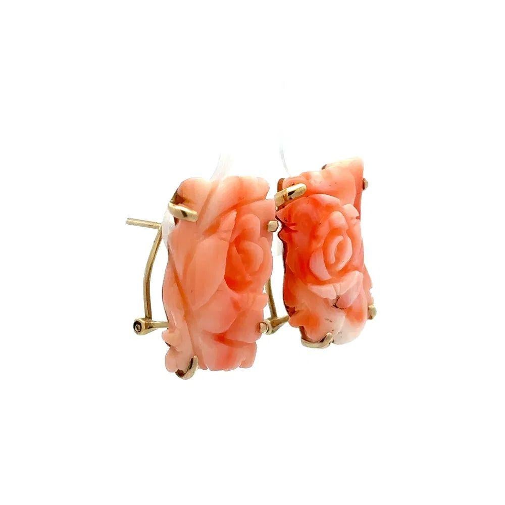Simply Beautiful! Finely detailed Vintage Hand carved Flower design Angel Skin Coral Gold Earrings. Hand set with awesome Exquisitely Hand carved Angel Skin Coral in Hand crafted in 14K Yellow Gold mounting. More Beautiful in Real time! Sure to be