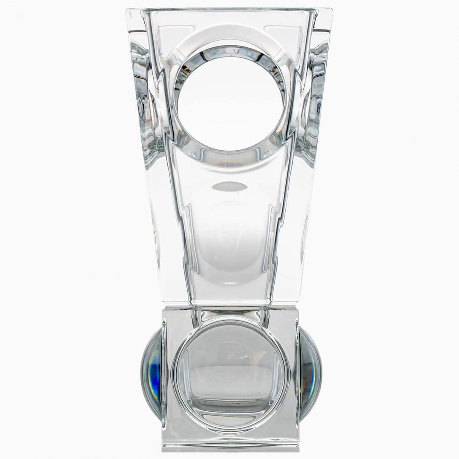 A crystal masterpiece of beautiful proportions, this vase crystallize the extraordinary know-how of the Baccarat craftsmen. The holes and thickness variations in the vase produce a magic visual effect.

Baccarat is a French luxury house and