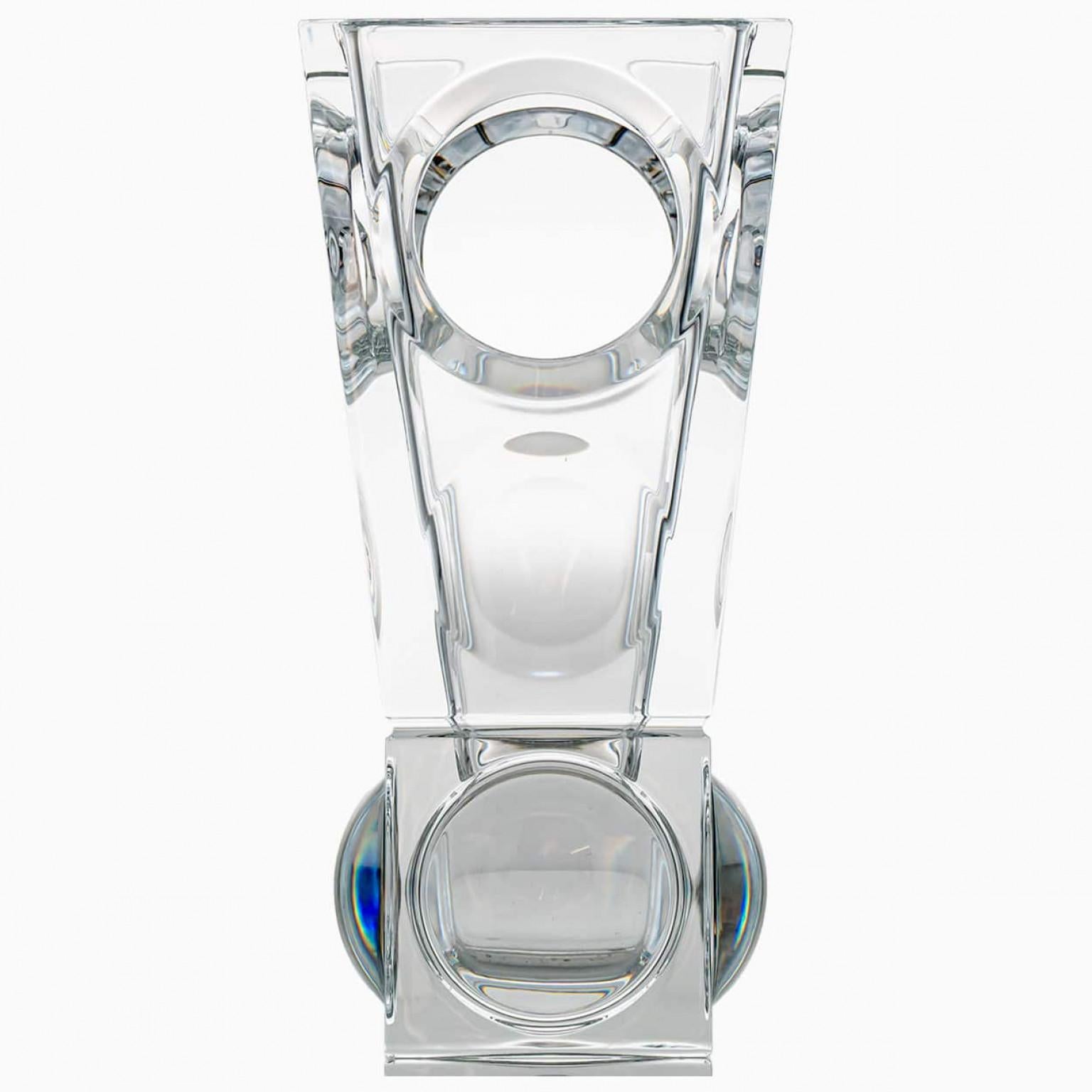 A crystal masterpiece of beautiful proportions, this vase crystallize the extraordinary know-how of the Baccarat craftsmen. The holes and thickness variations in the vase produce a magic visual effect.

Baccarat is a French luxury house and