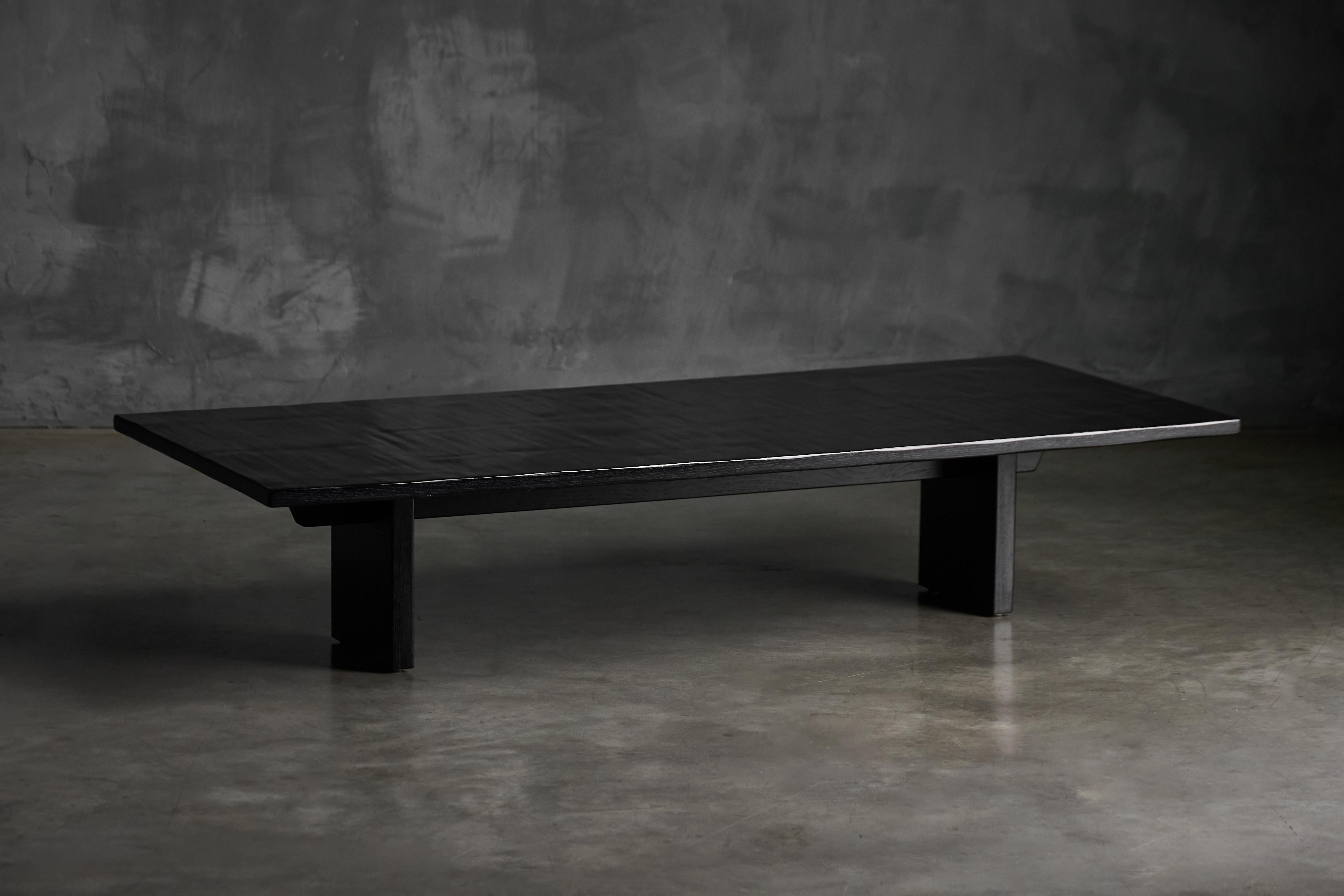 This exceptional coffee table by Axel Vervoordt embodies his signature fusion of wabi sabi philosophy and Japanese aesthetic sensibility. Its distinctive rectangular form is both grounded and refined, balancing architectural clarity with organic