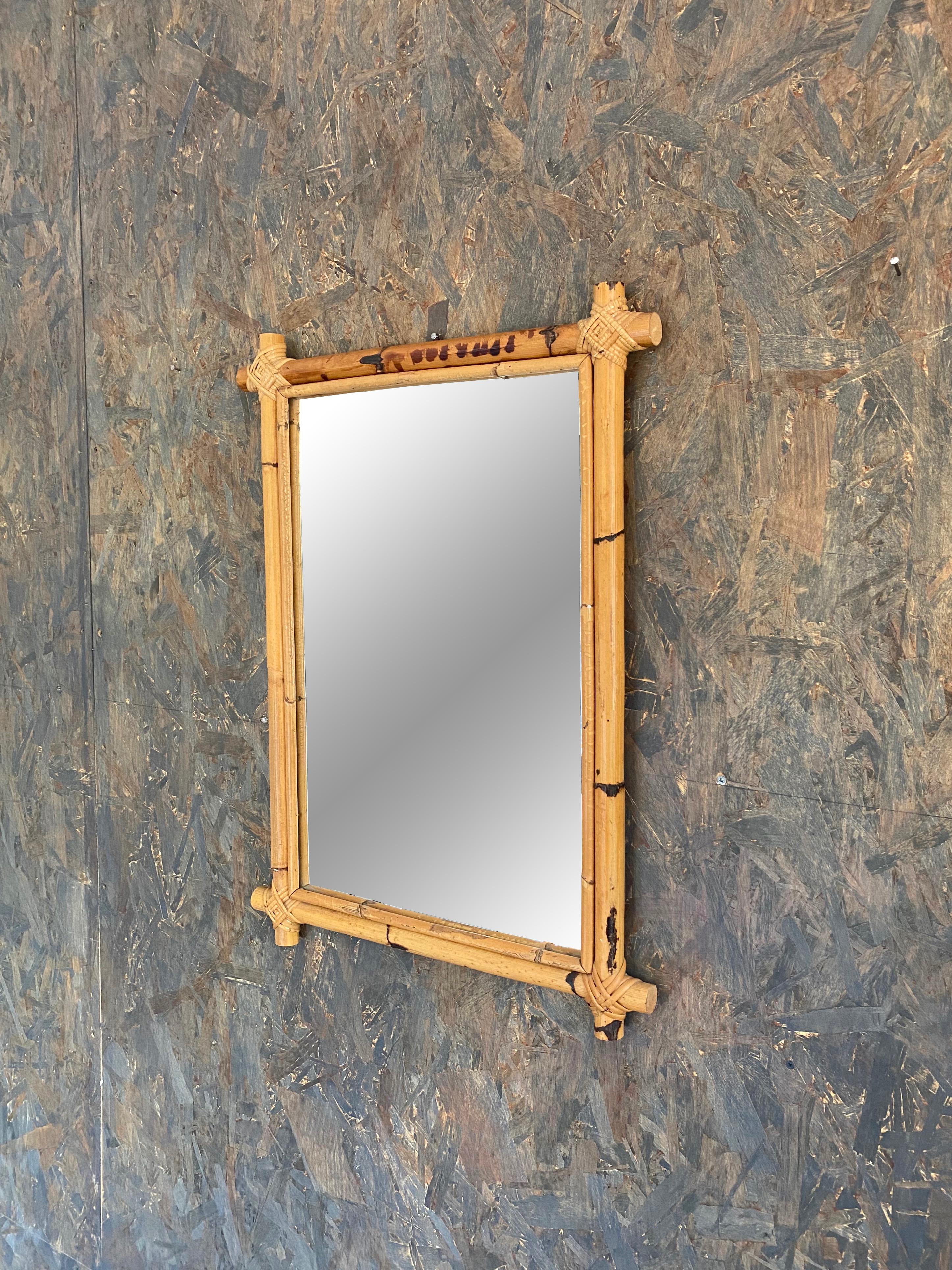 Italian wall mirror with a rectangular bamboo frame, 1970s.