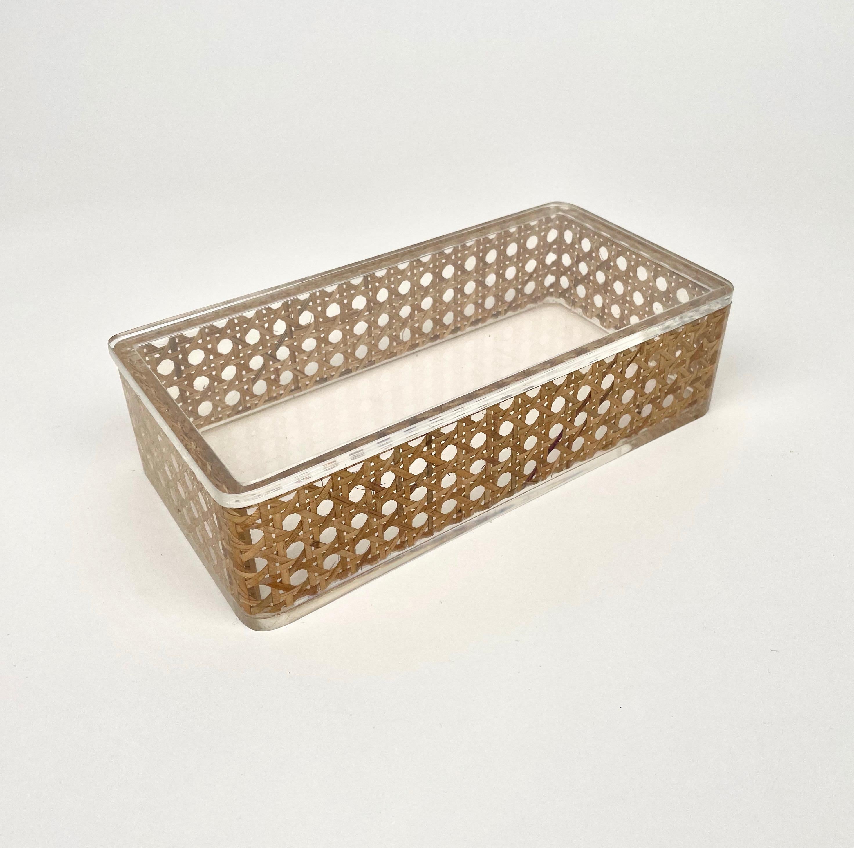 Rectangular box in lucite and rattan in the style of Christian Dior Home. 

 Made in Italy in the 1970s.