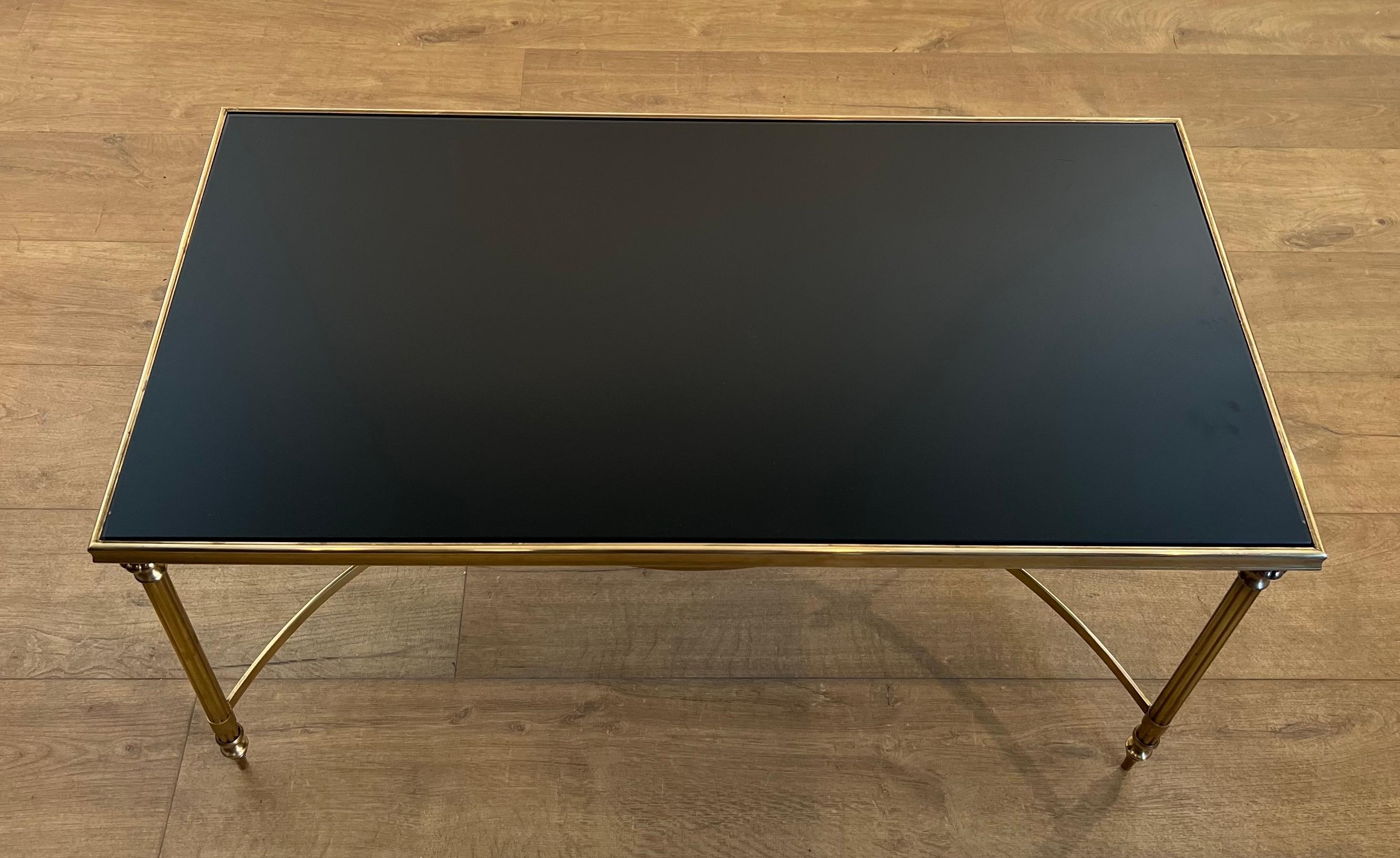 Laqué Table basse rectangulaire en laiton avec plateau en verre laqué noir par Maison Jansen en vente