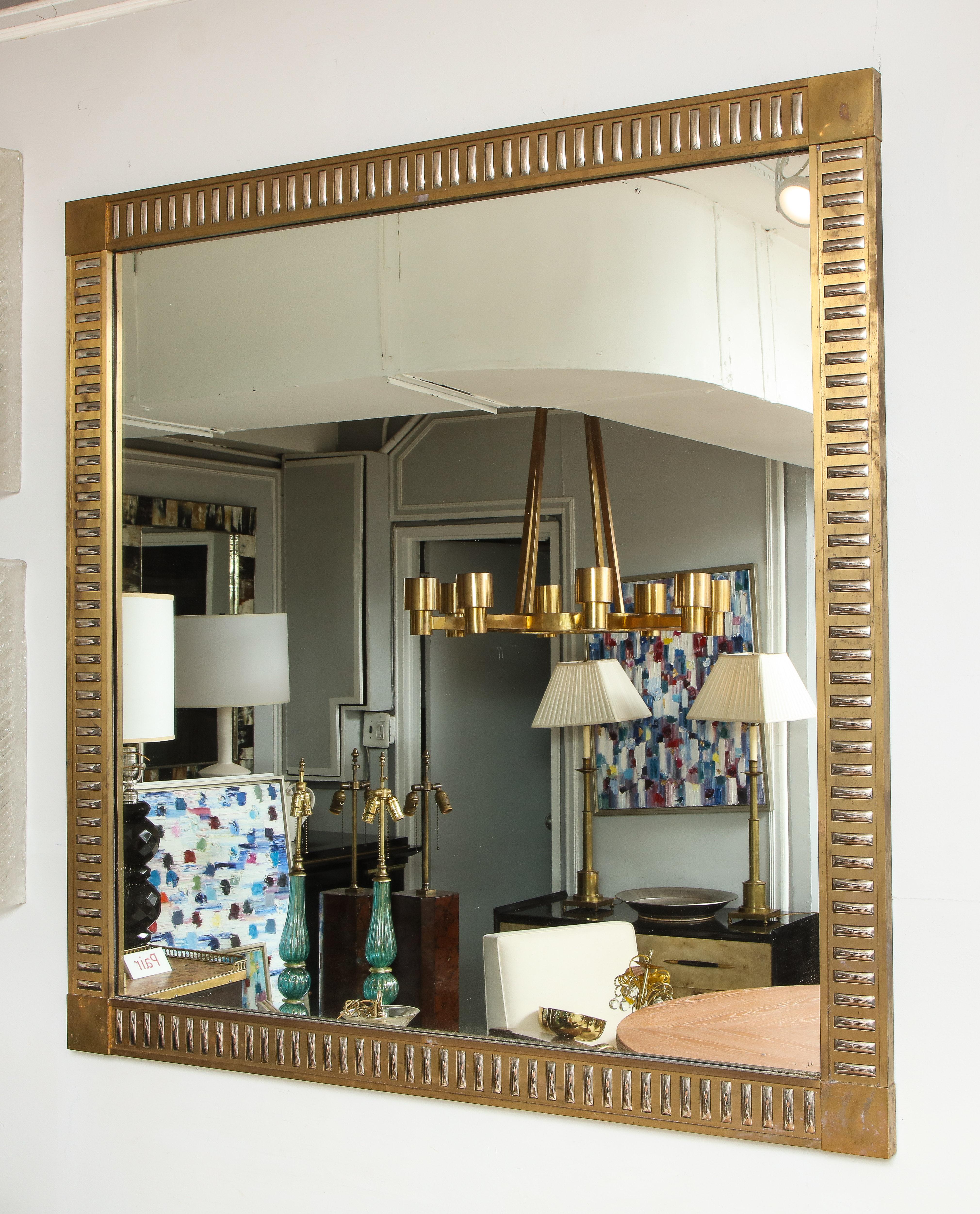 Rectangular bronze mirror with chrome inserts in the neoclassic manner.