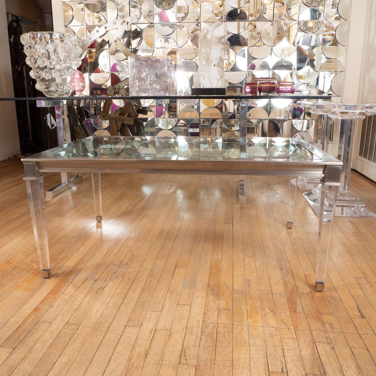 Rectangular brushed nickel and glass coffee table.
