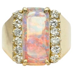 Cocktailring mit rechteckigem Cabochon-Opal und Diamanten aus 14-karätigem Gelbgold