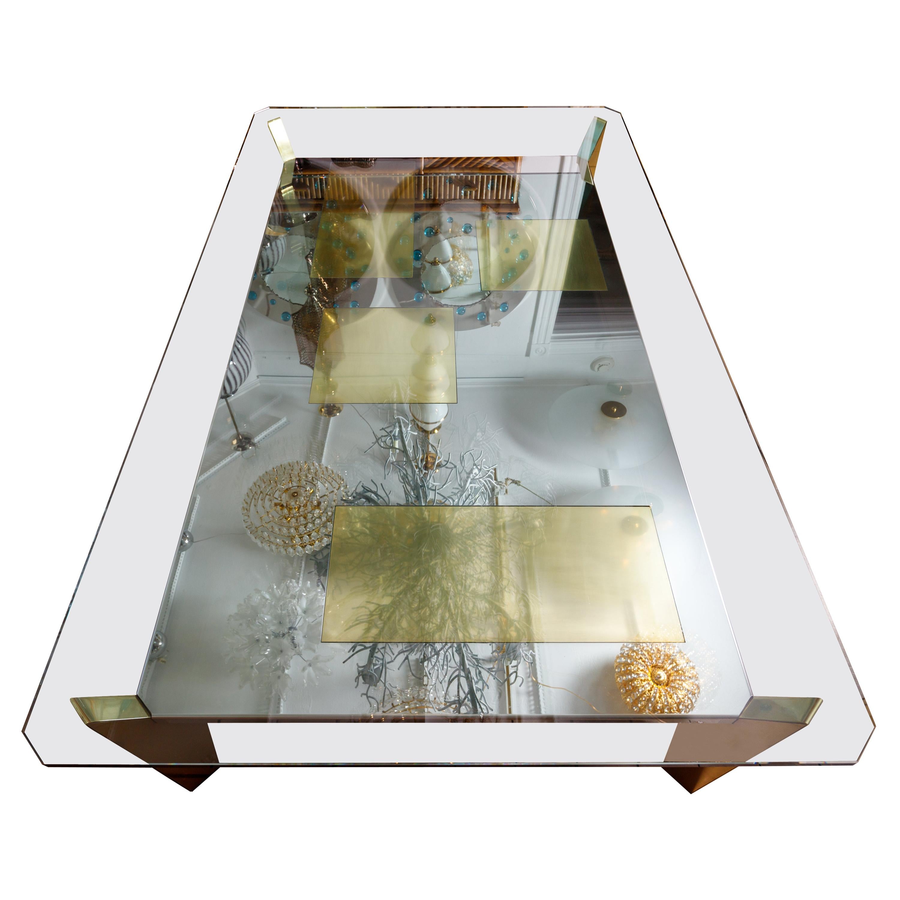 Table basse rectangulaire en verre chromé avec incrustations en laiton