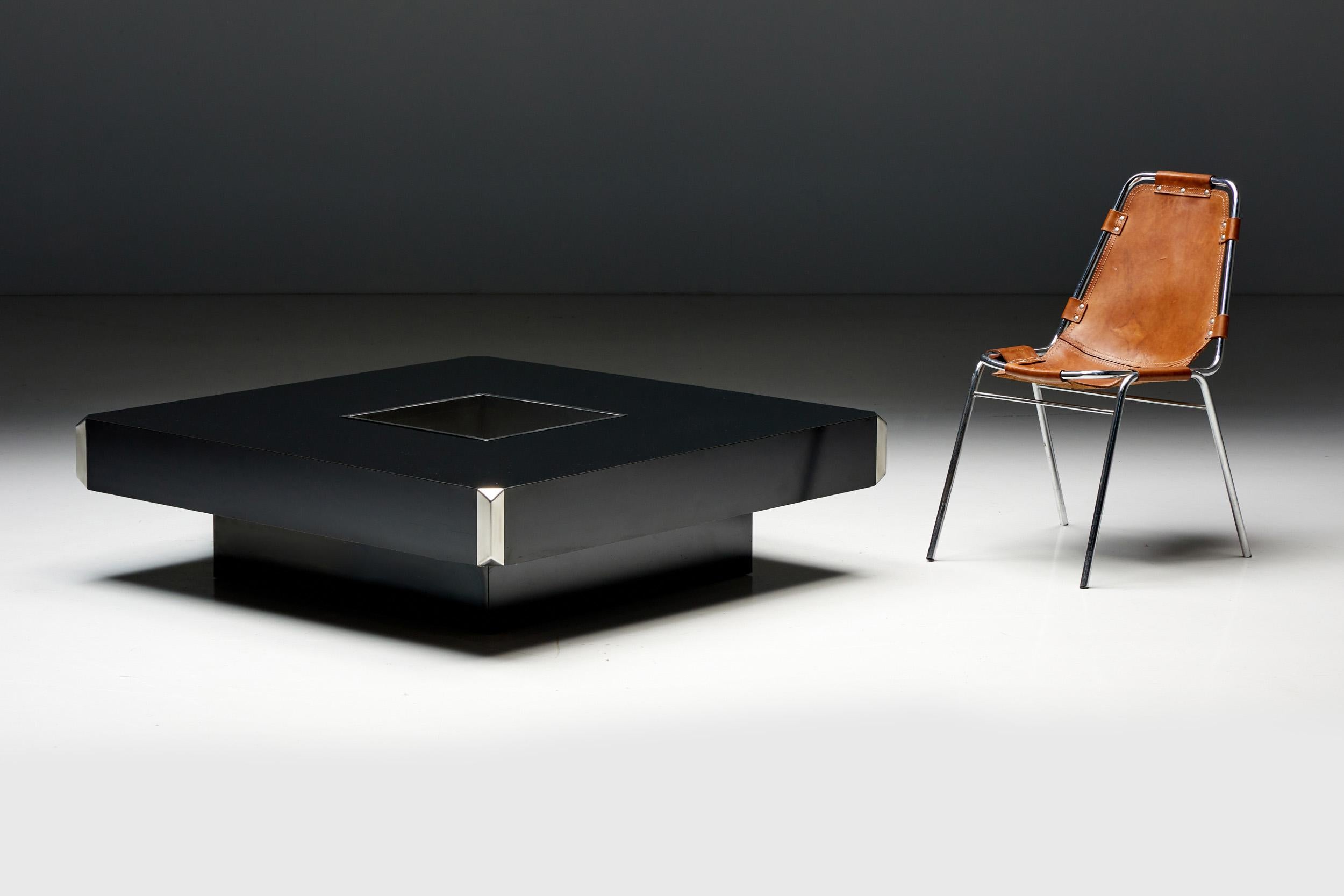 Hollywood Regency; Willy Rizzo; Black Formica; 1970s; Space Age; Italy; Mid-Century Modern; 20th Century; Modernist;

Rectangular cocktail table designed by Willy Rizzo for Cidue in the 1970s. This iconic coffee table boasts a sleek black formica