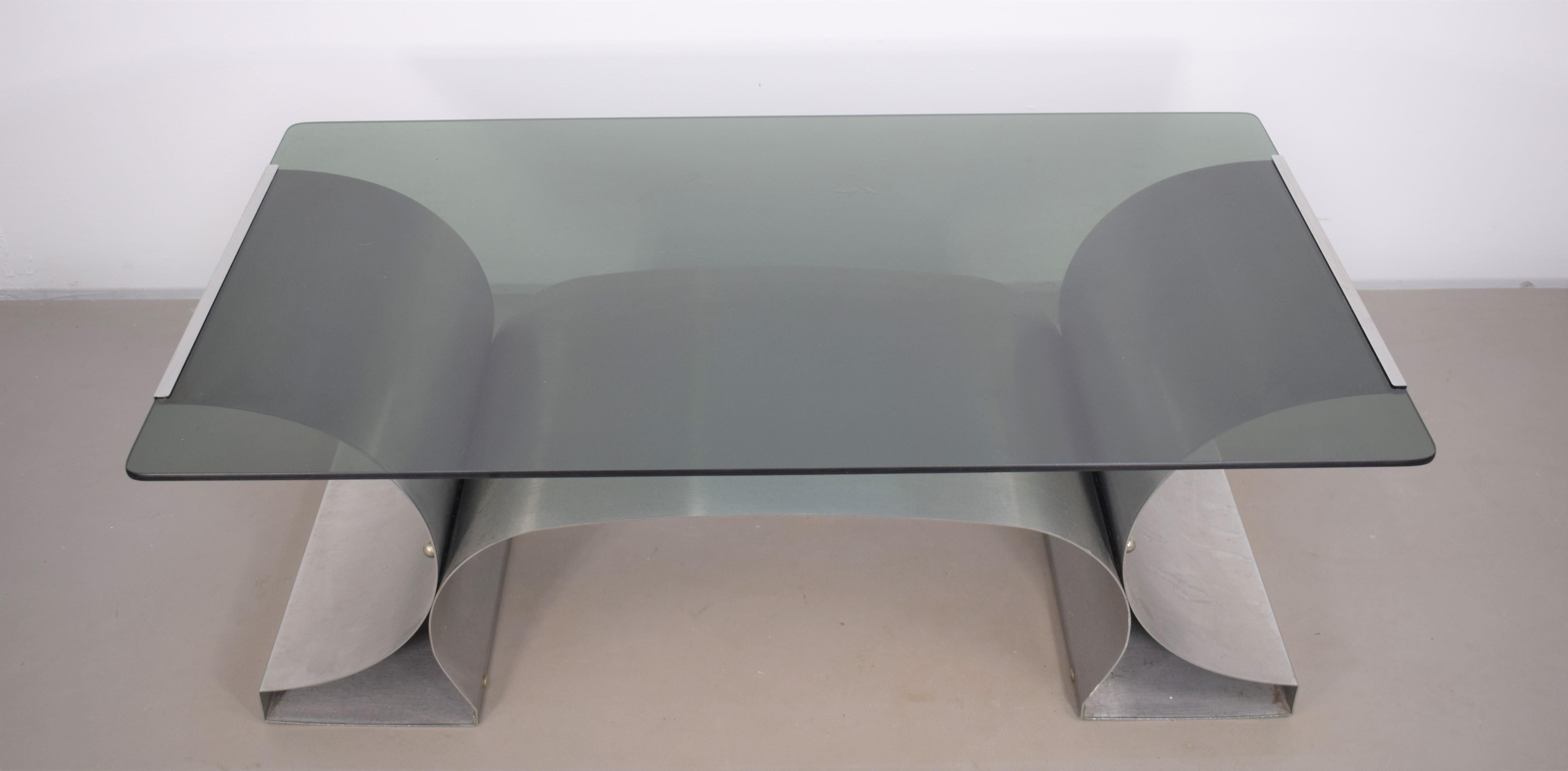 Rectangular coffee table by Francois Monnet, France, 1970s.

Dimensions: H= 40 cm; W= 105 cm; D= 60 cm.