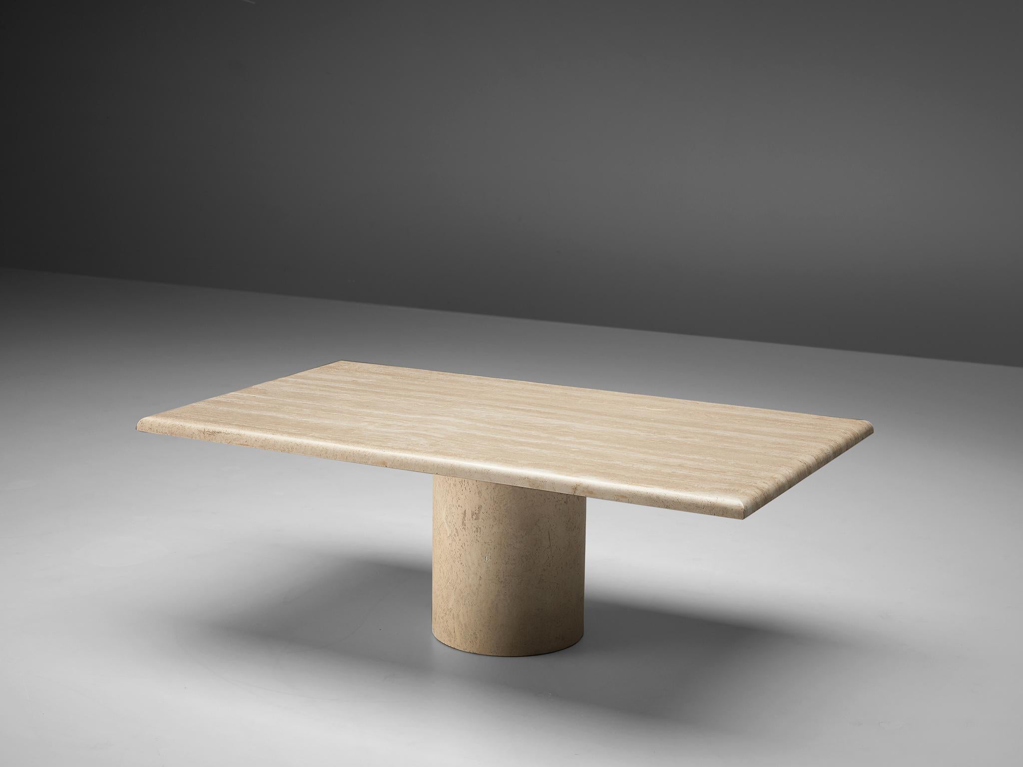 Coffee table, travertine, Italy, 1970s

With a travertine angular tabletop and a strong cylindric travertine base this pedestal coffee table shows a minimalistic design. The bright travertine gives the table a sculptural look. The natural layers of