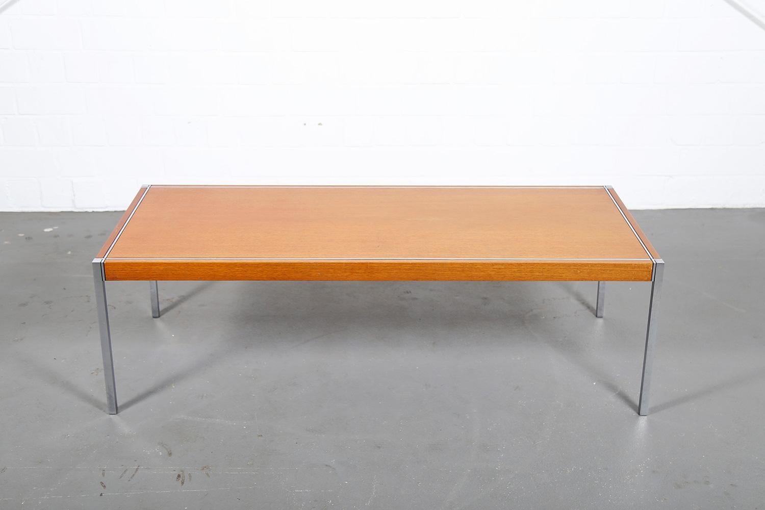 Rectangular coffee table designed by Richard Schultz for Knoll International – model “455-2” made of a teak table top and chrome legs. Hard to find! Marked on the underside with the Knoll manufacturer’s label.