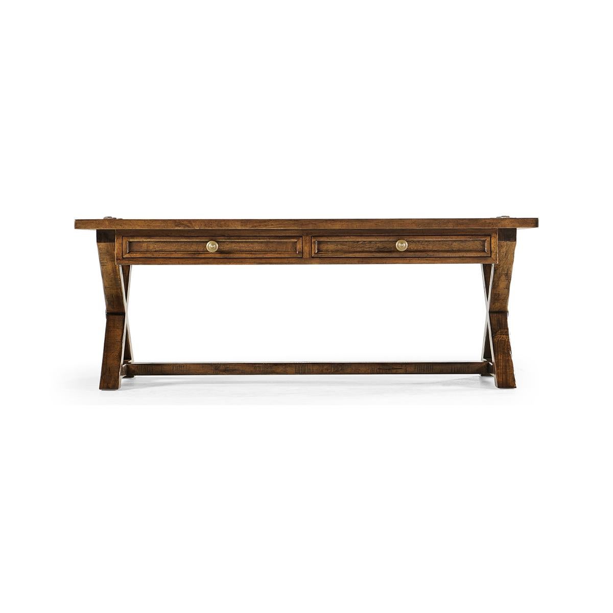 Rectangular country coffee table with a rustic walnut finish revealing exposed saw marks. Two small oak-lined drawers to the front. Mortice and tenon joints to X-frame support and top surface.

Dimensions: 54