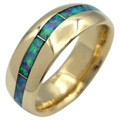 Anillo de oro amarillo de 14 quilates con incrustación de ópalo de corte curvo rectangular
